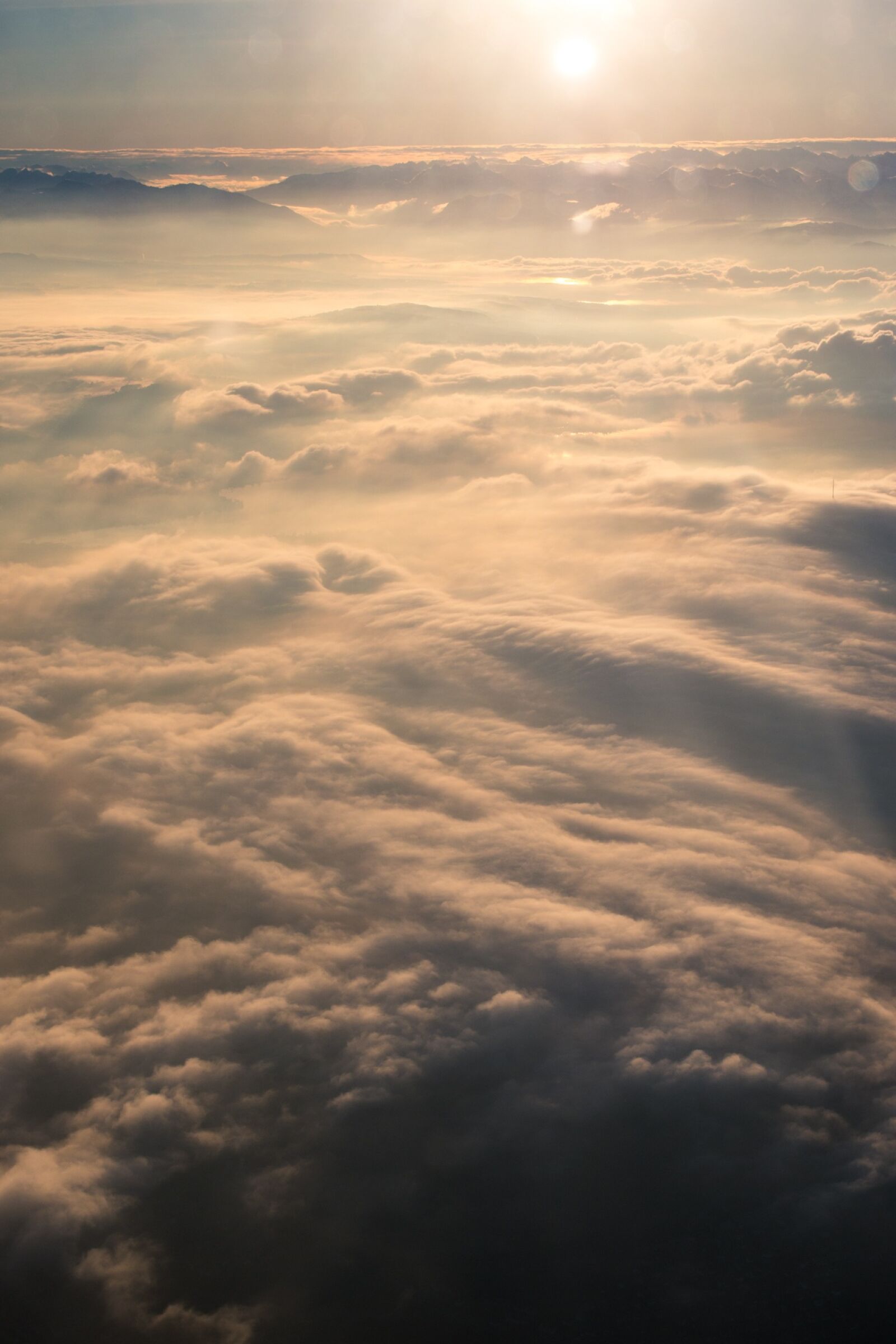 Canon EOS 70D + Canon EF 40mm F2.8 STM sample photo. Clouds, aircraft, above the photography