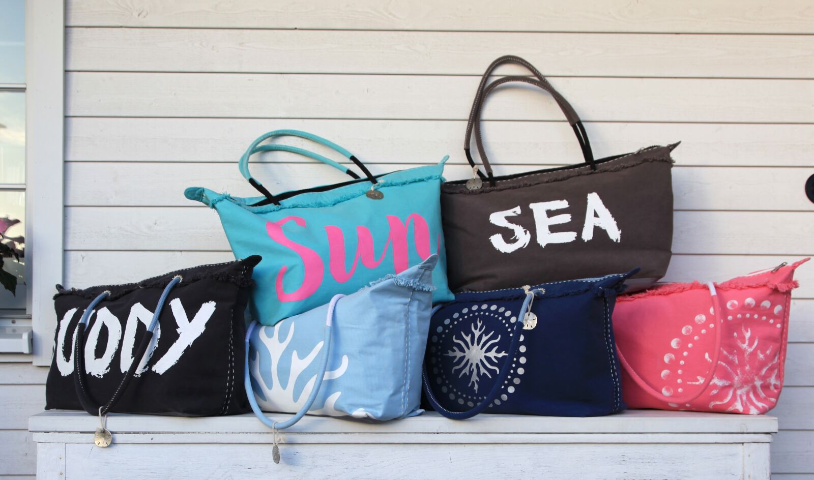 Canon EOS 5D Mark II sample photo. Vacations, beach, towels photography