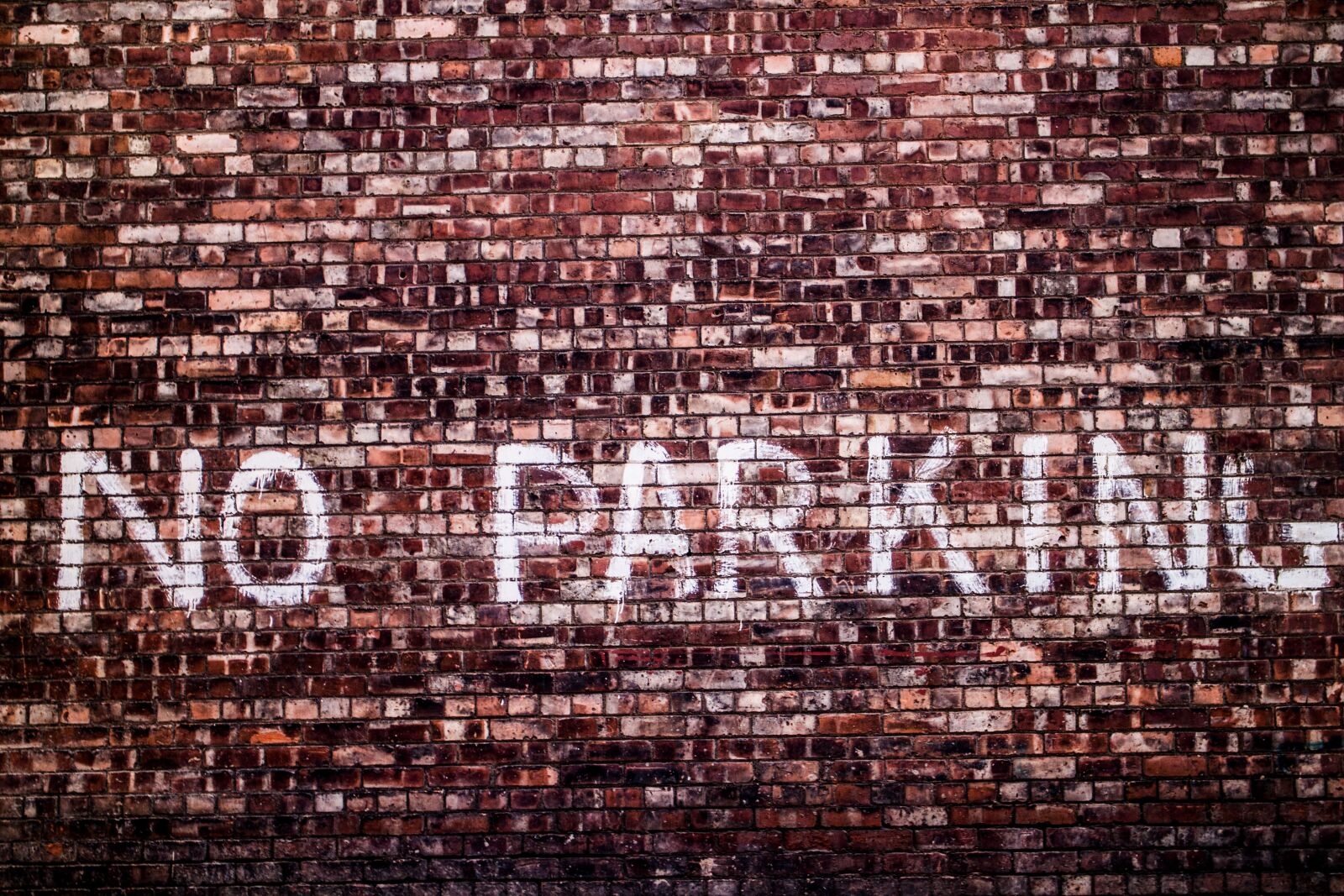 Canon EOS M sample photo. Brick wall, no parking photography