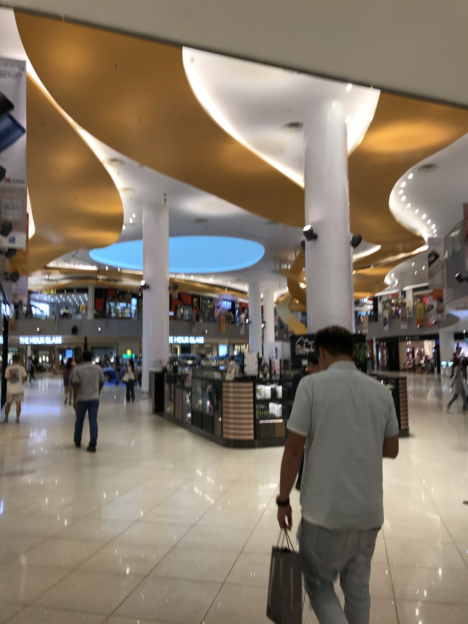 iPhone 7 back camera 3.99mm f/1.8 sample photo. Architecture, mall, shopping, singapore photography
