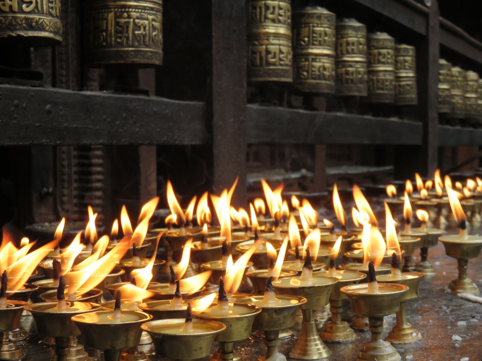 Canon PowerShot SX700 HS sample photo. Candles, offering, temple photography