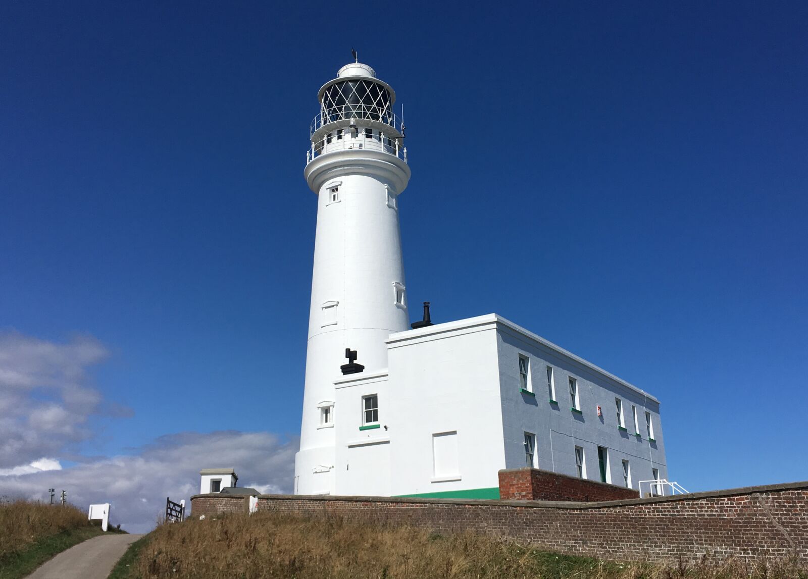 iPhone SE back camera 4.15mm f/2.2 sample photo. Lighthouse, seaside, flamborough photography