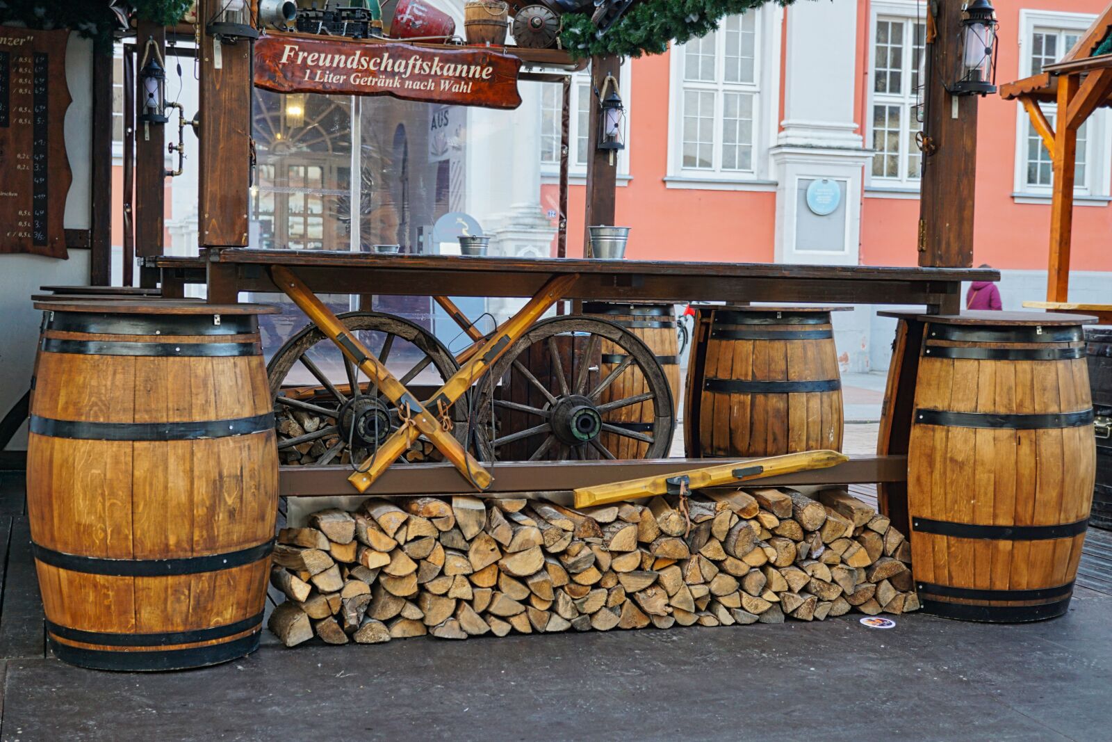 Sony a5100 sample photo. Christmas market, barrels, stand photography