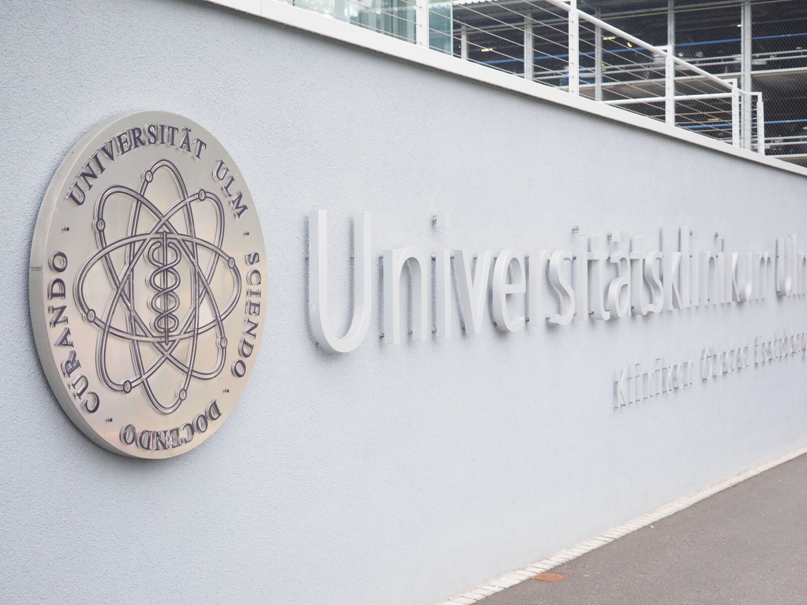 Olympus OM-D E-M1 + Olympus M.Zuiko Digital ED 12-40mm F2.8 Pro sample photo. University ulm, emblem, logo photography