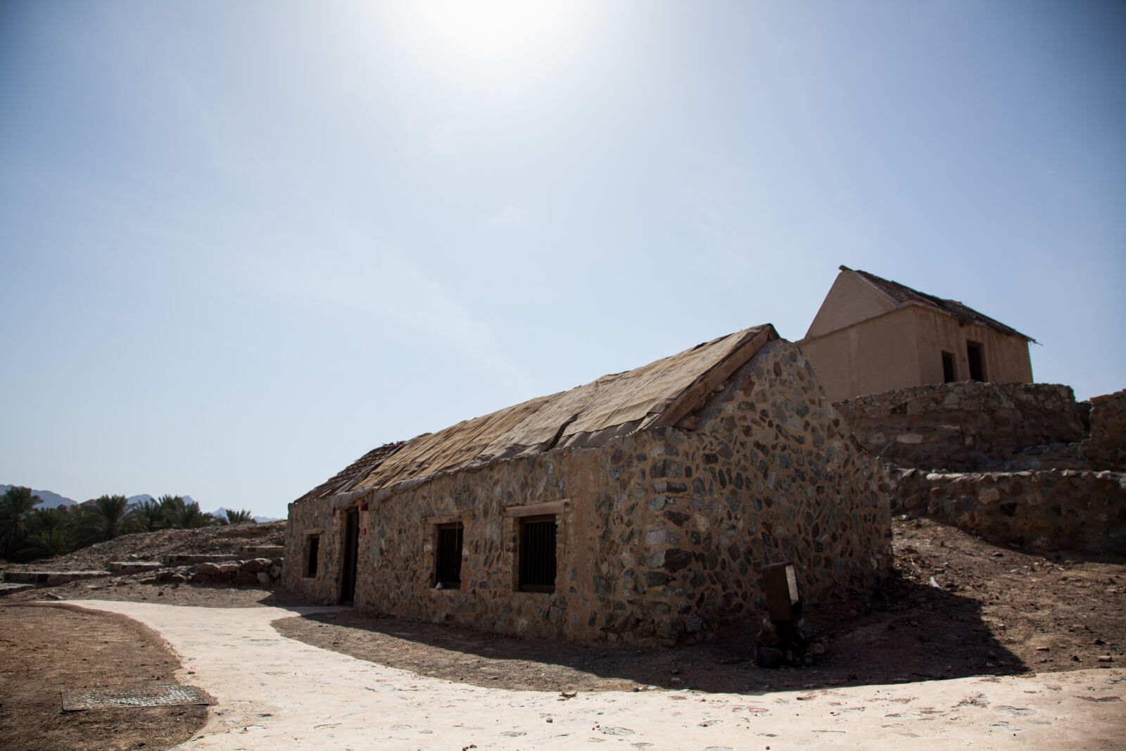 Canon EOS 5D Mark II + Canon EF 24-105mm F4L IS USM sample photo. Dubai, outhouse, primitive, stone photography