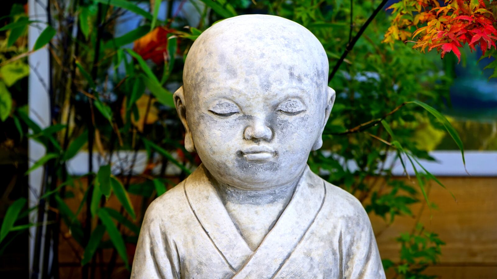 Sony a7 + Sony FE 28-70mm F3.5-5.6 OSS sample photo. Buddha, garden, statue photography
