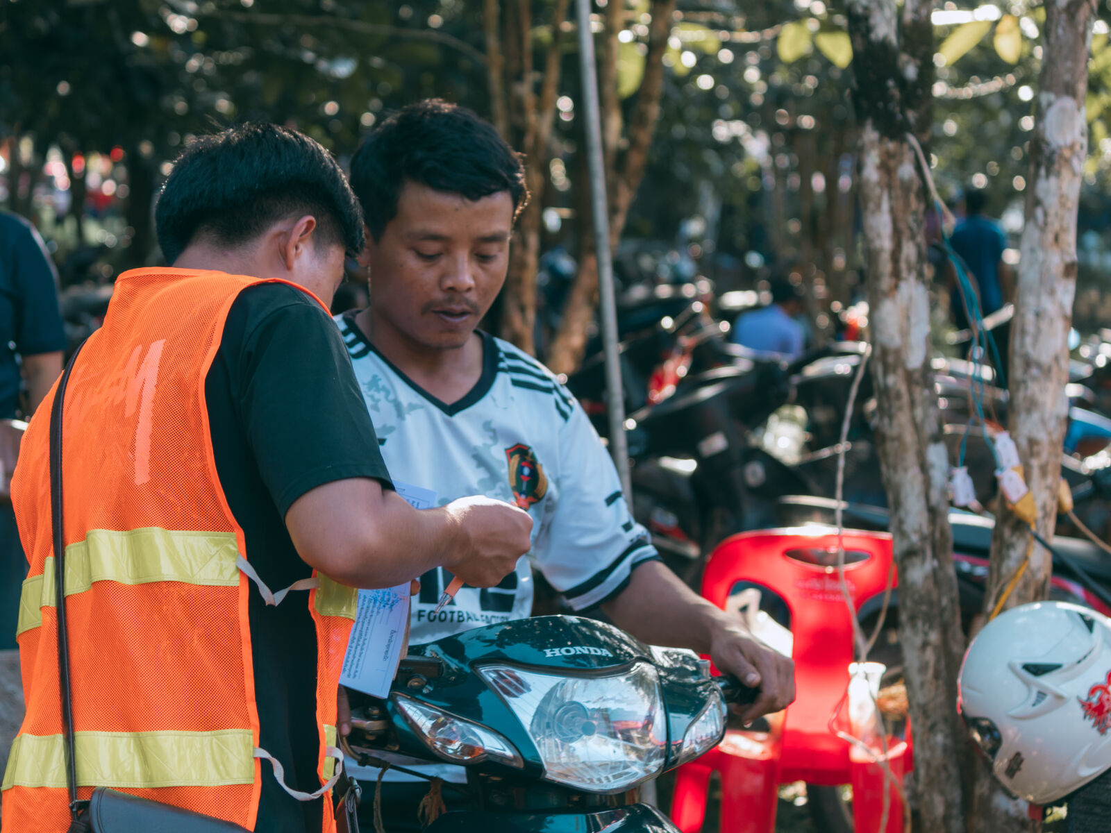 Canon EF-S 55-250mm F4-5.6 IS II sample photo. Motobike parking scenario photography