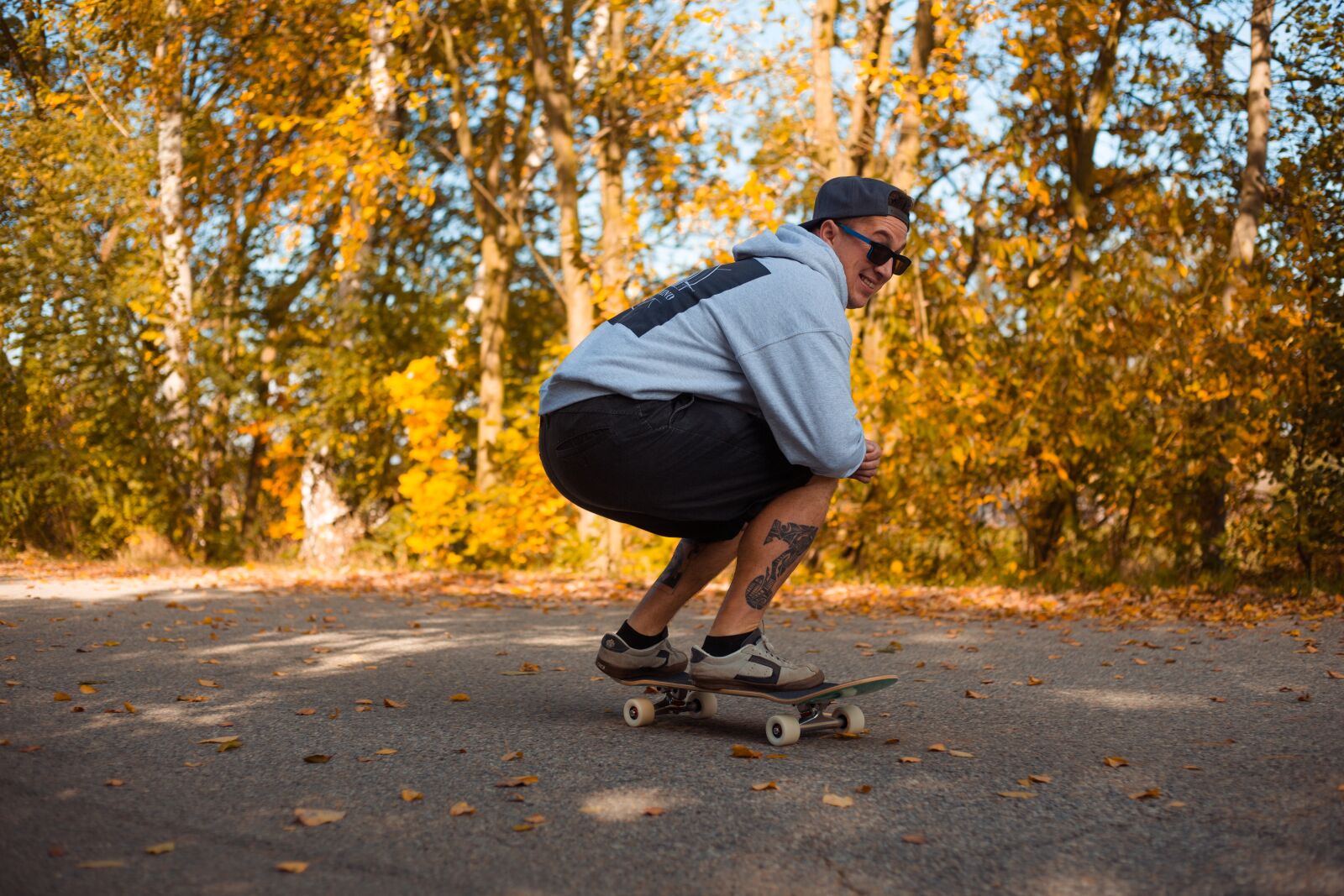 Canon EF 50mm F1.8 II sample photo. Skateboard, man, autumn photography