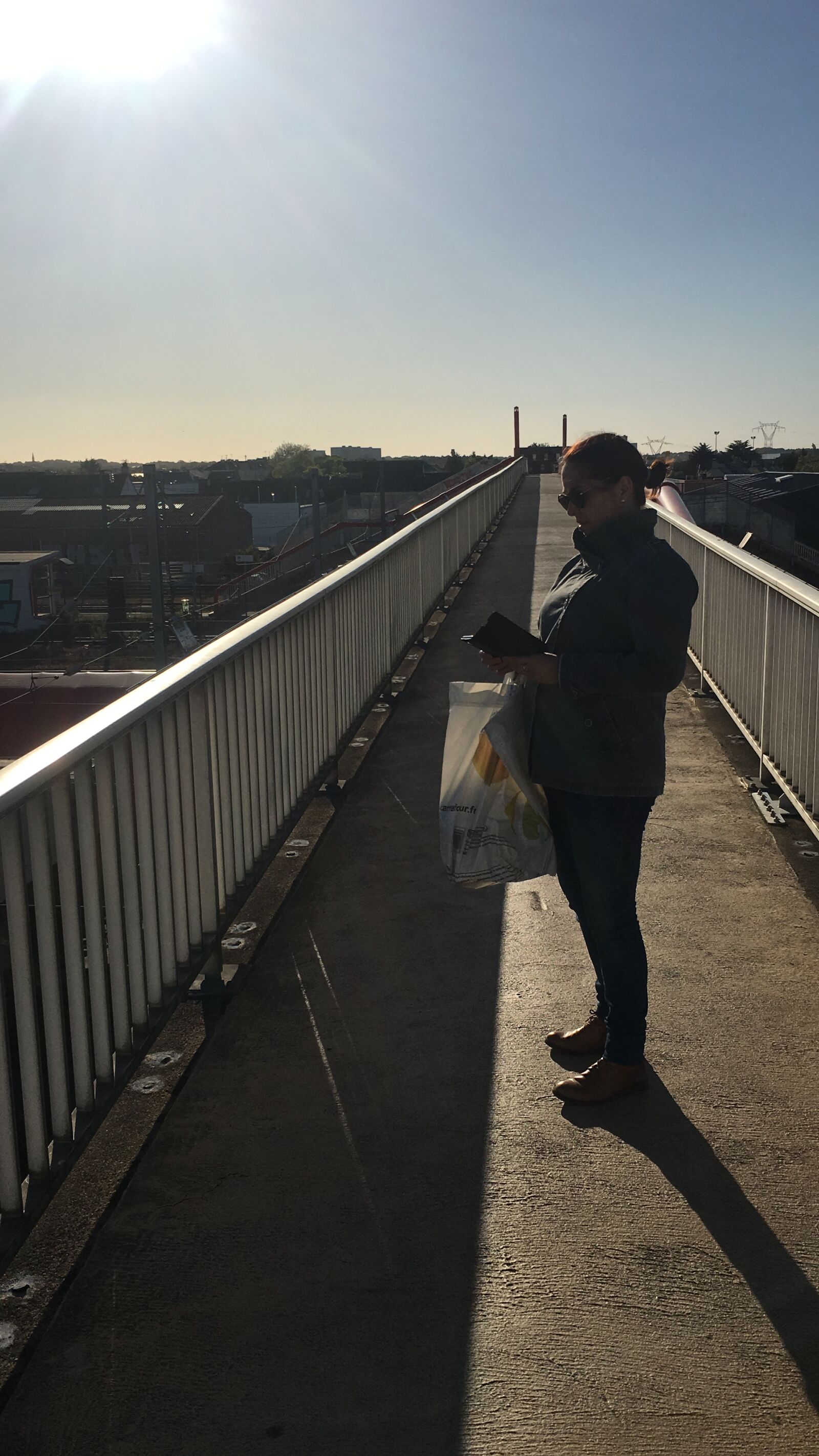 Apple iPhone 6s sample photo. Pont, sun, urban photography