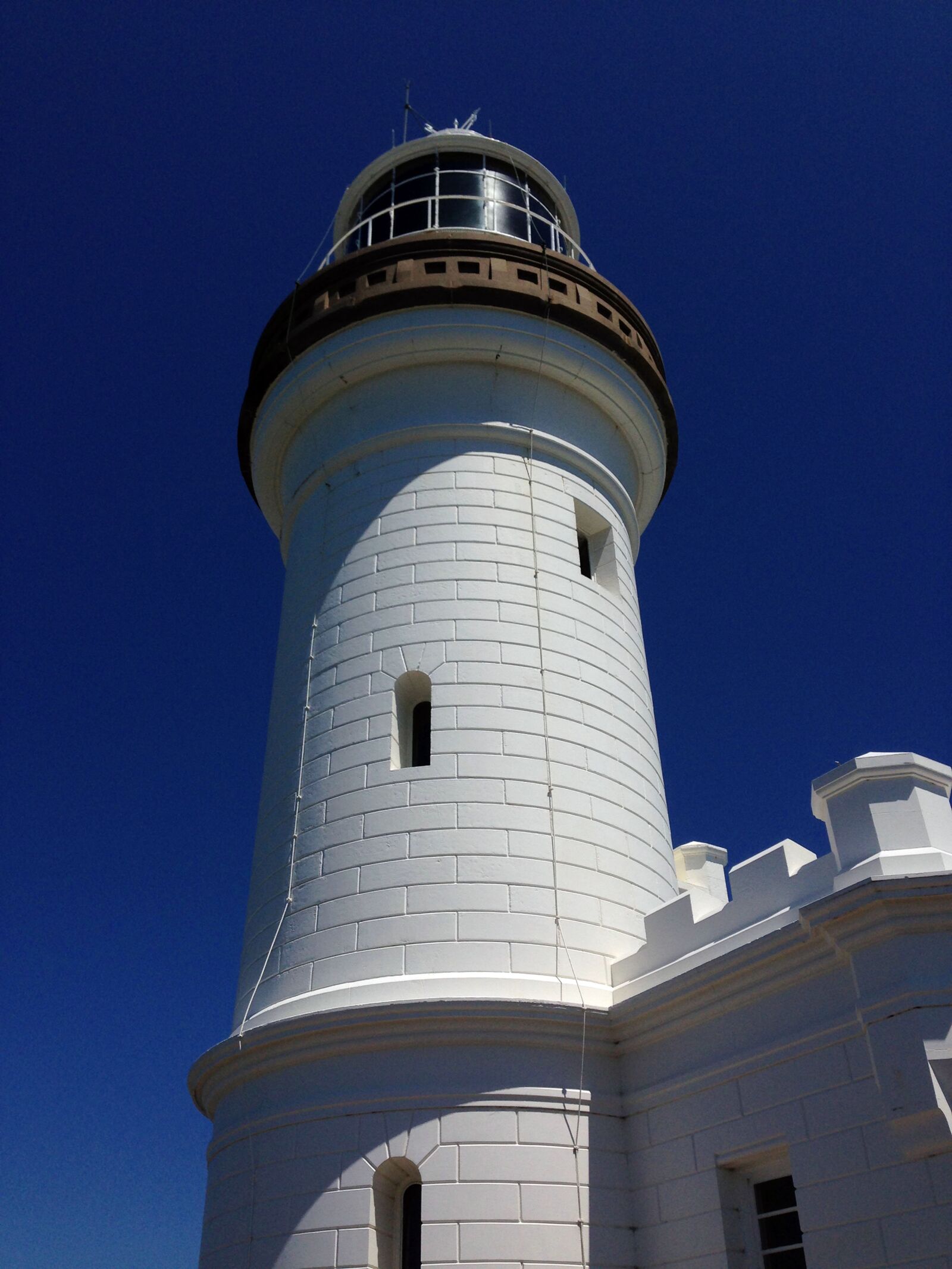 Nikon D7100 + iPhone 5 back camera 4.12mm f/2.4 sample photo. Lighthouse, byron bay, australia photography