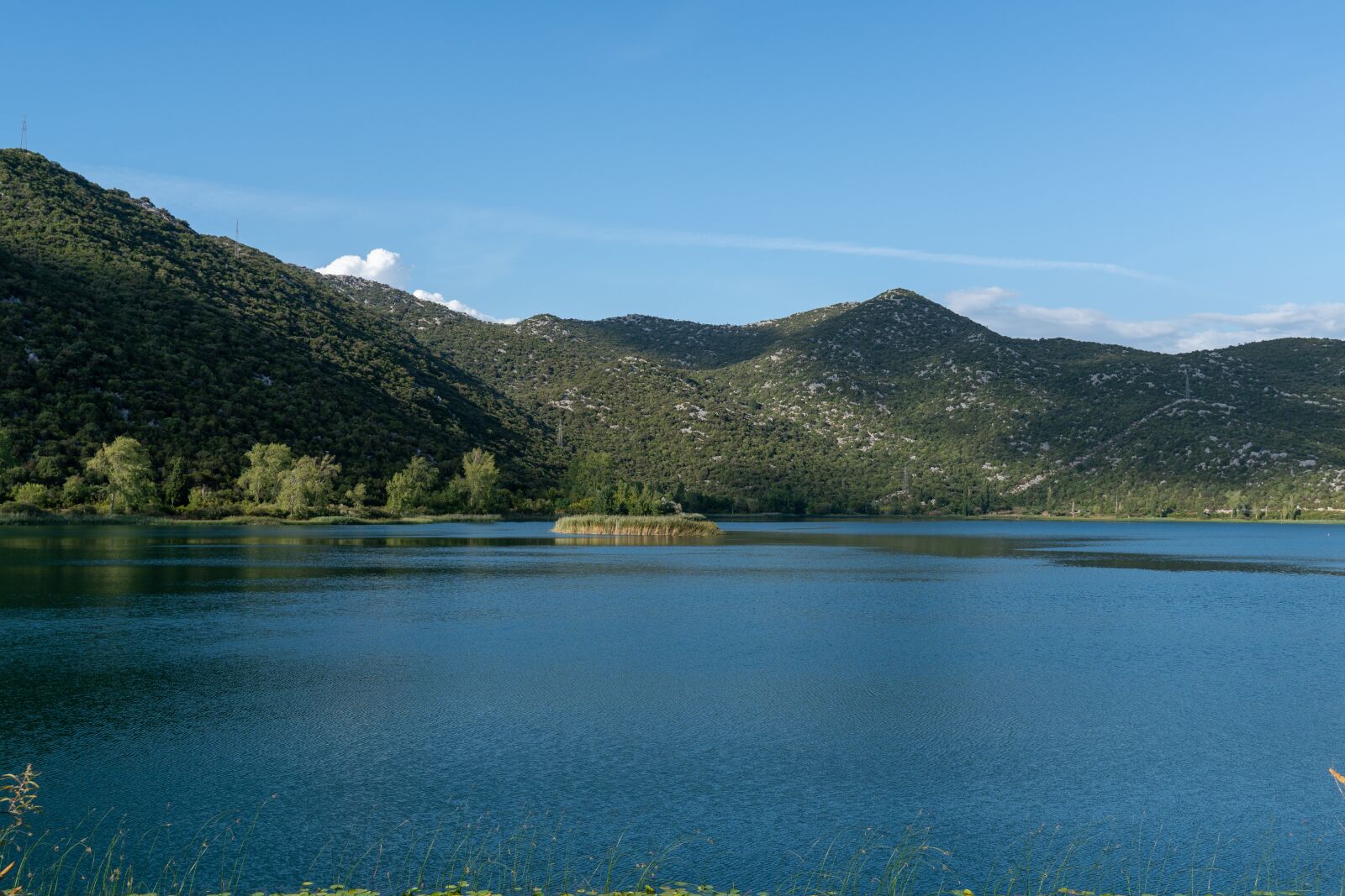 Tamron 28-75mm F2.8 Di III RXD sample photo. Lake, island, meadow photography