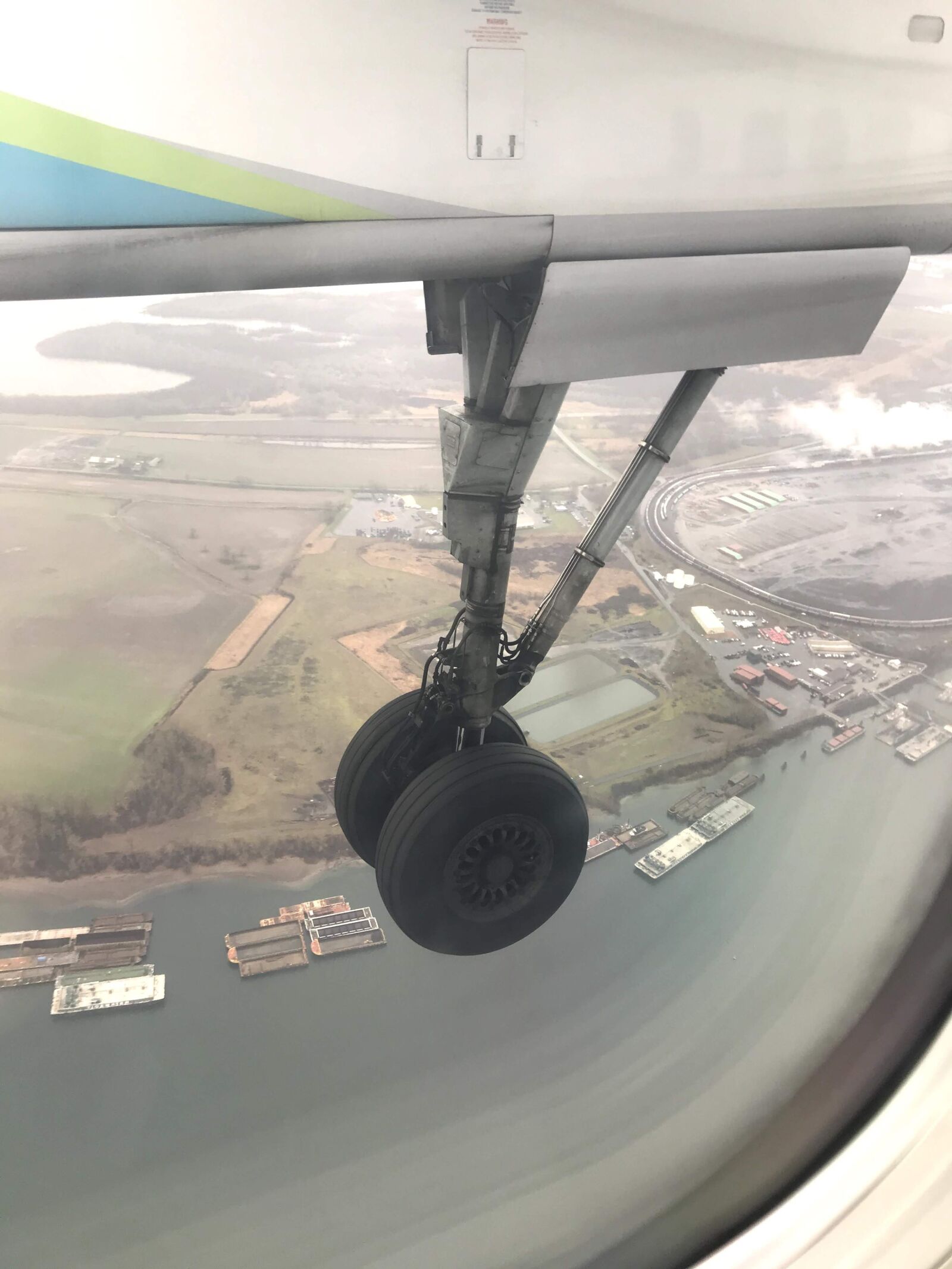 iPhone 7 back camera 3.99mm f/1.8 sample photo. Plane, wheel, airplane photography