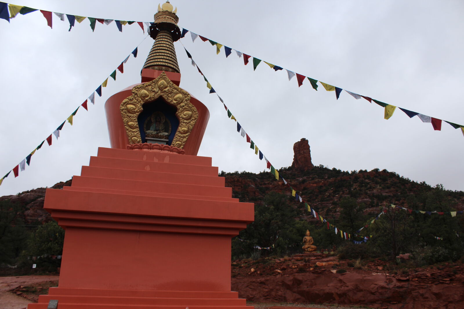 Canon EOS 1200D (EOS Rebel T5 / EOS Kiss X70 / EOS Hi) sample photo. Budha, colors, flags, fog photography