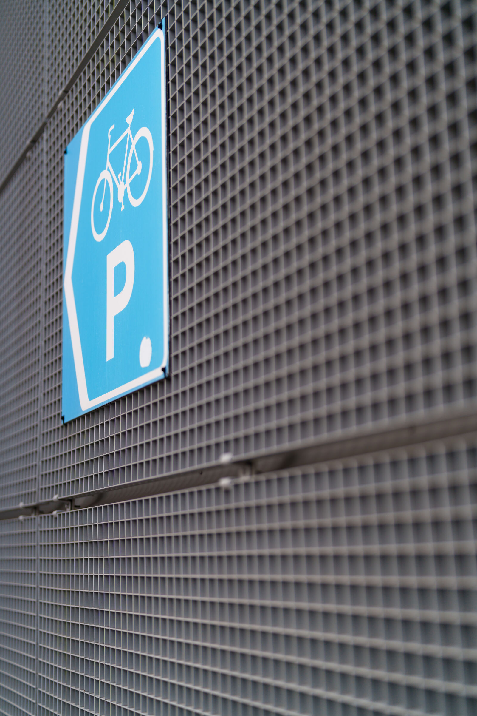 Sony FE 50mm F1.4 GM sample photo. Bicycle parking sign photography