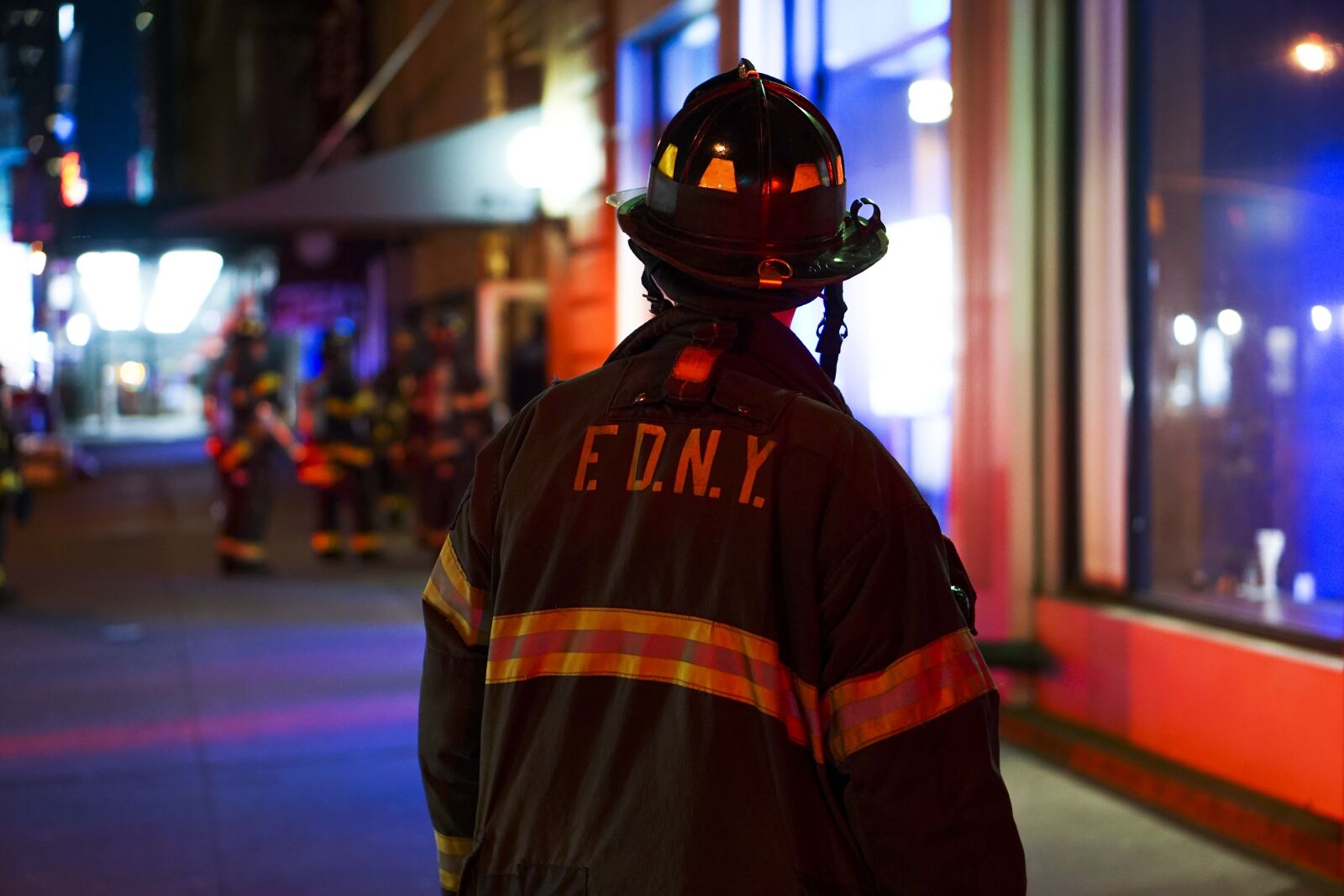 E 50mm F1.8 OSS sample photo. Fire, night, fire fighter photography