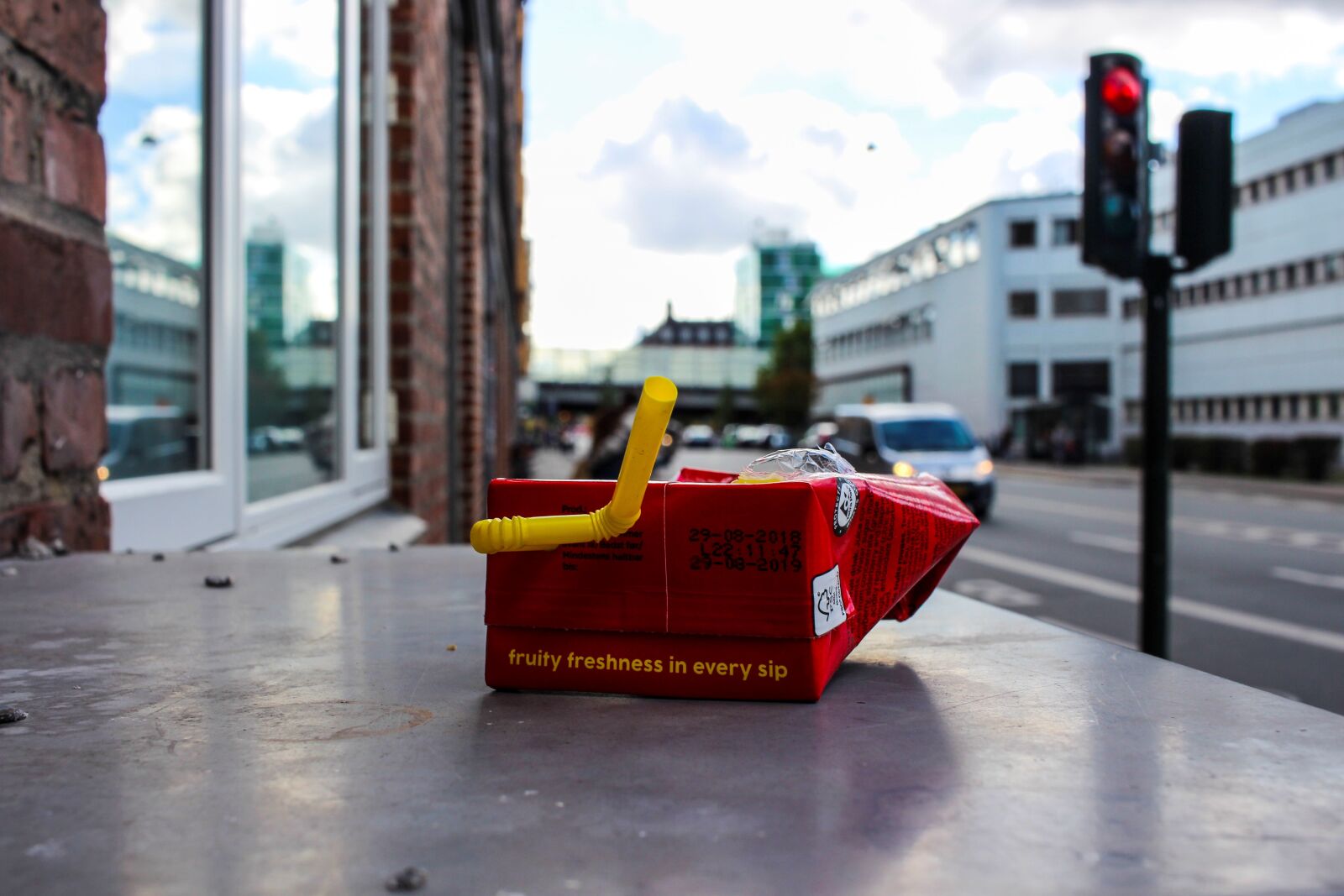 Canon EF-S 24mm F2.8 STM sample photo. Plastic waste, waste, city photography