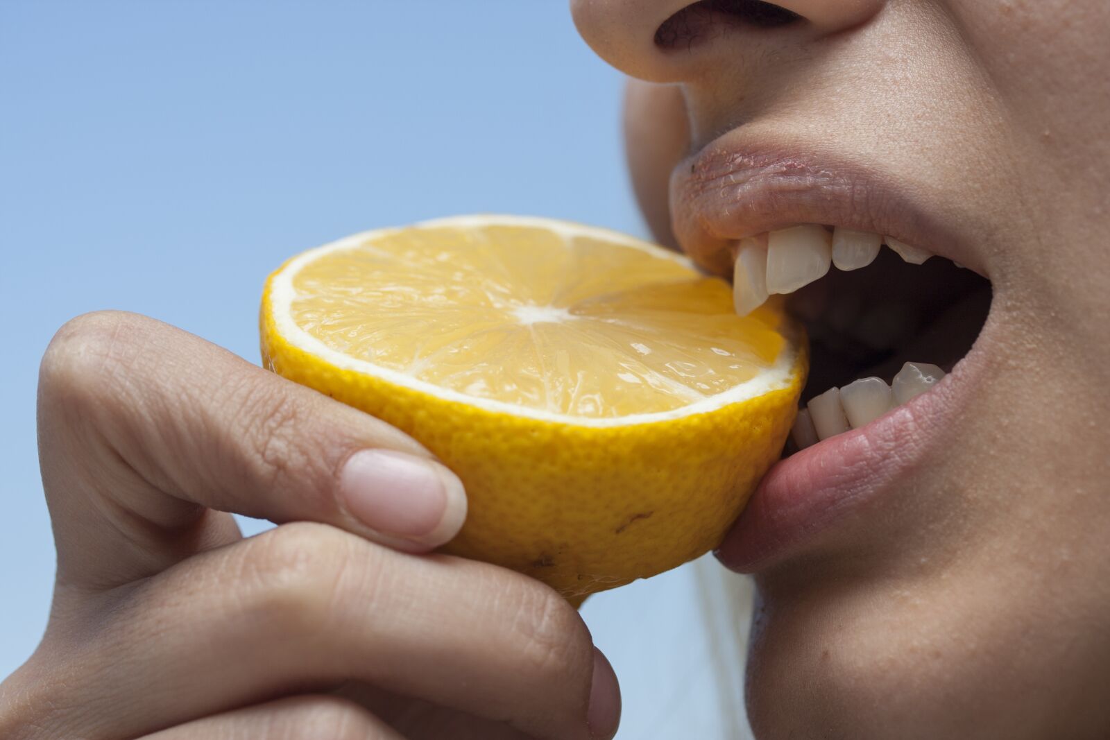 Canon EOS 40D sample photo. Eating, bite, lemon photography