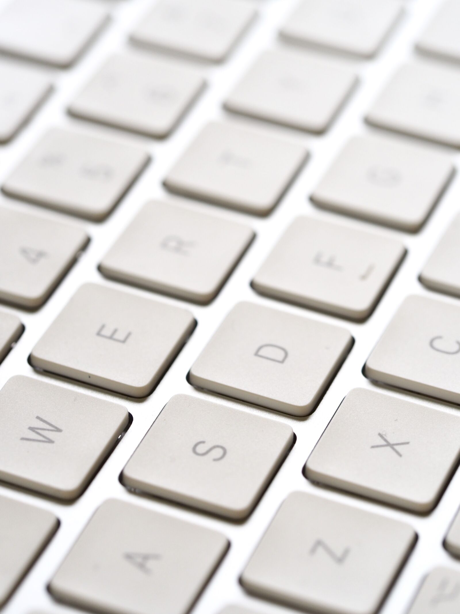 Olympus OM-D E-M10 II sample photo. Technology, white space, keyboard photography