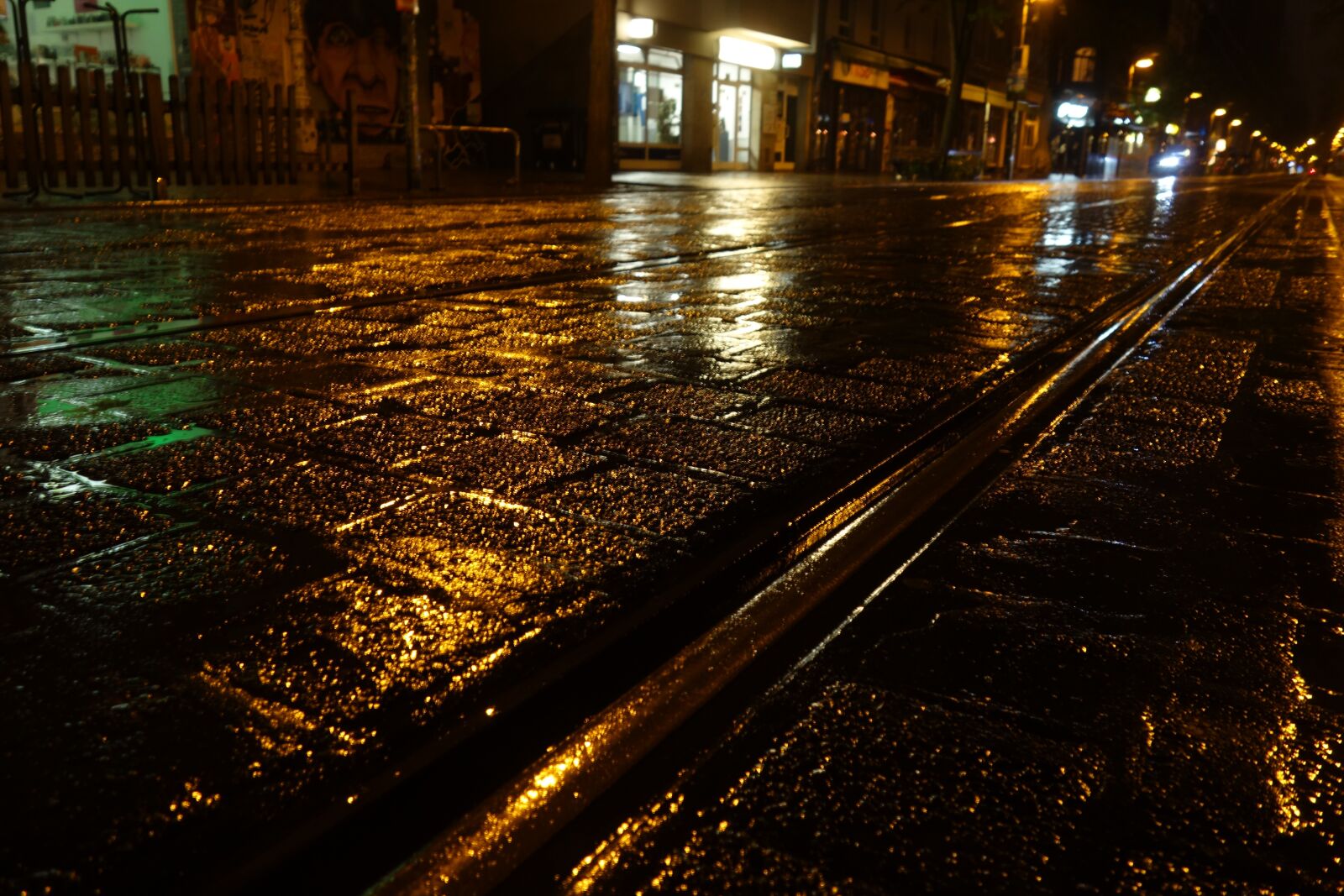 Sony Cyber-shot DSC-RX100 sample photo. Rail, rain, cobblestones photography