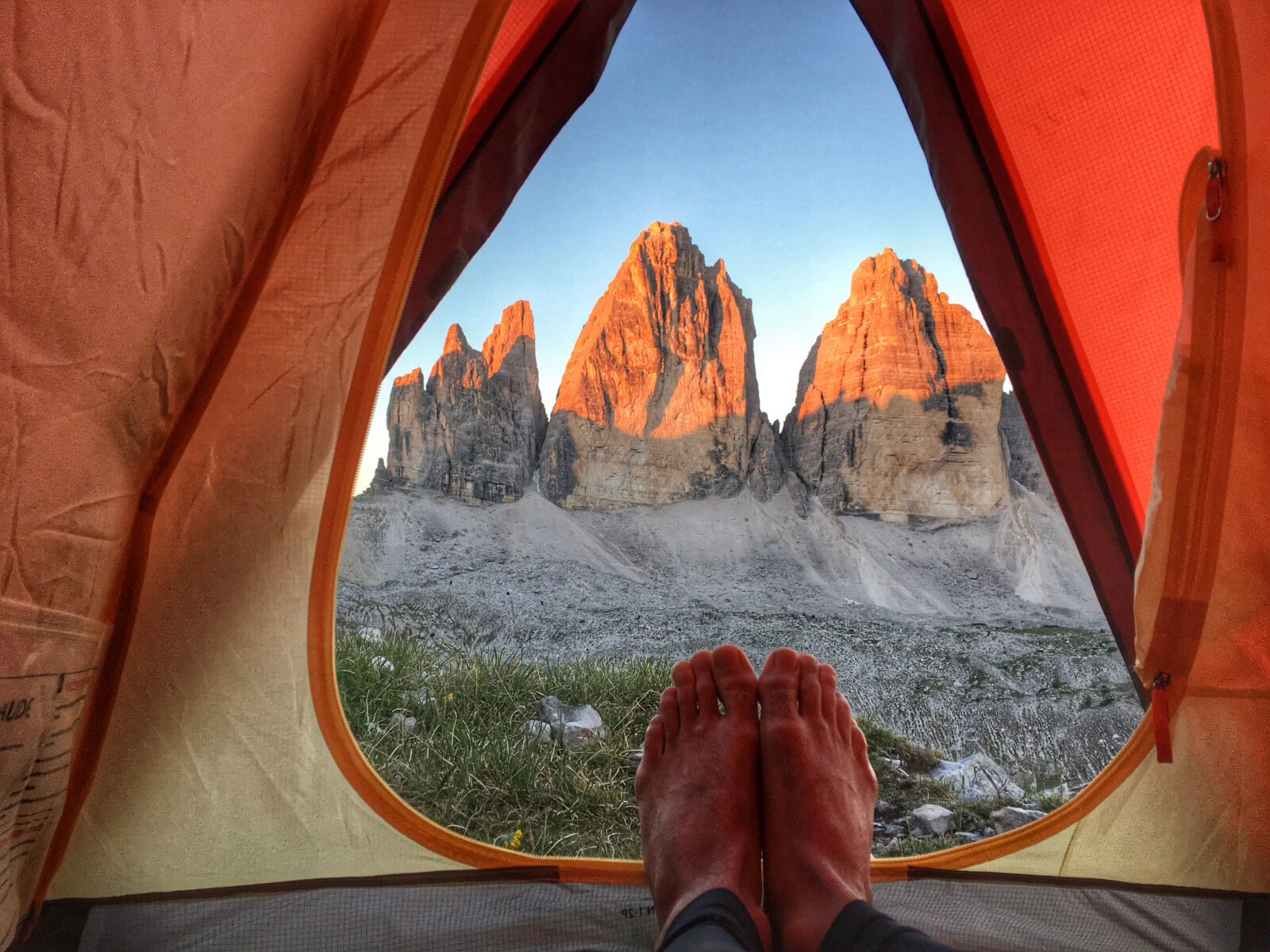 iPhone 6s Plus back camera 4.15mm f/2.2 sample photo. Camping, environment, feet, grass photography