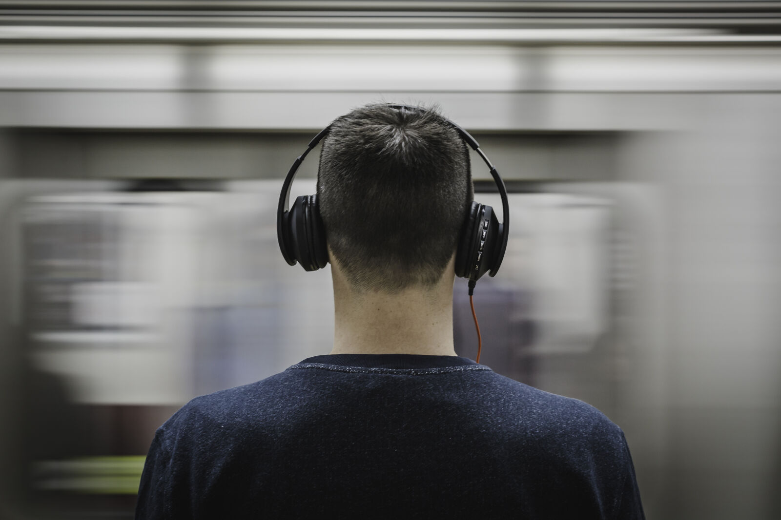 Canon EF 50mm F1.2L USM sample photo. Headphones, man, music, person photography