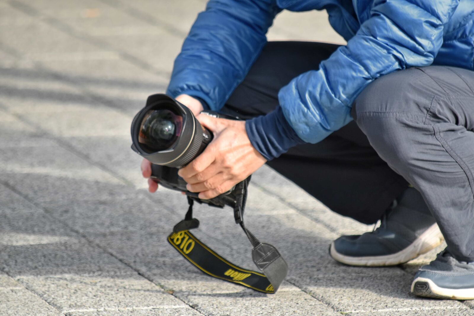 Nikon D5500 sample photo. Angle, hands, lens, photographer photography