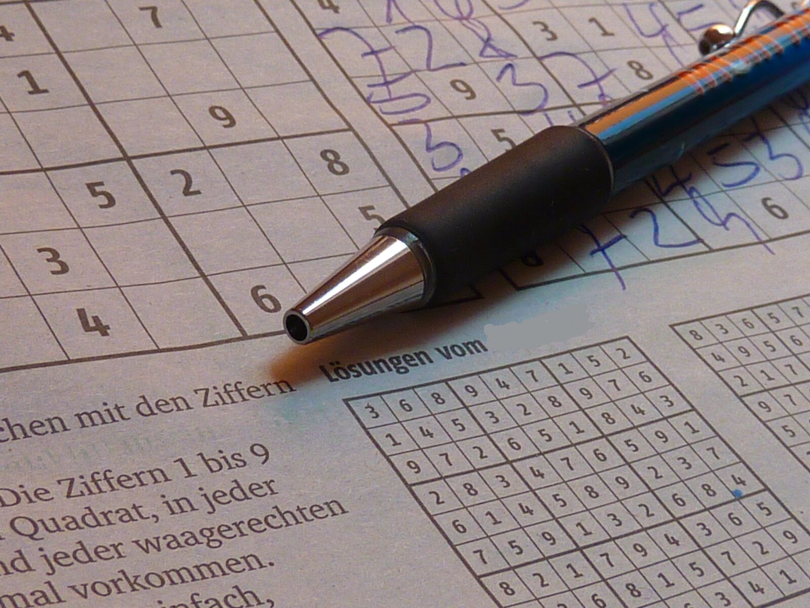 Panasonic DMC-TZ7 sample photo. Sudoku, pen, puzzles photography