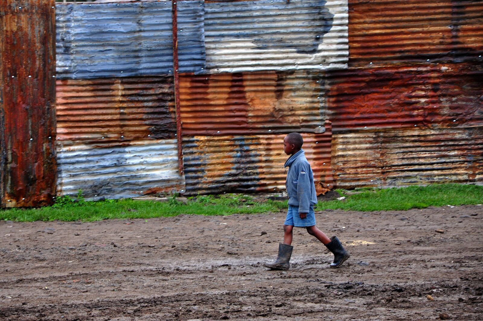 Nikon D90 sample photo. Africa, corrugated sheet, child photography