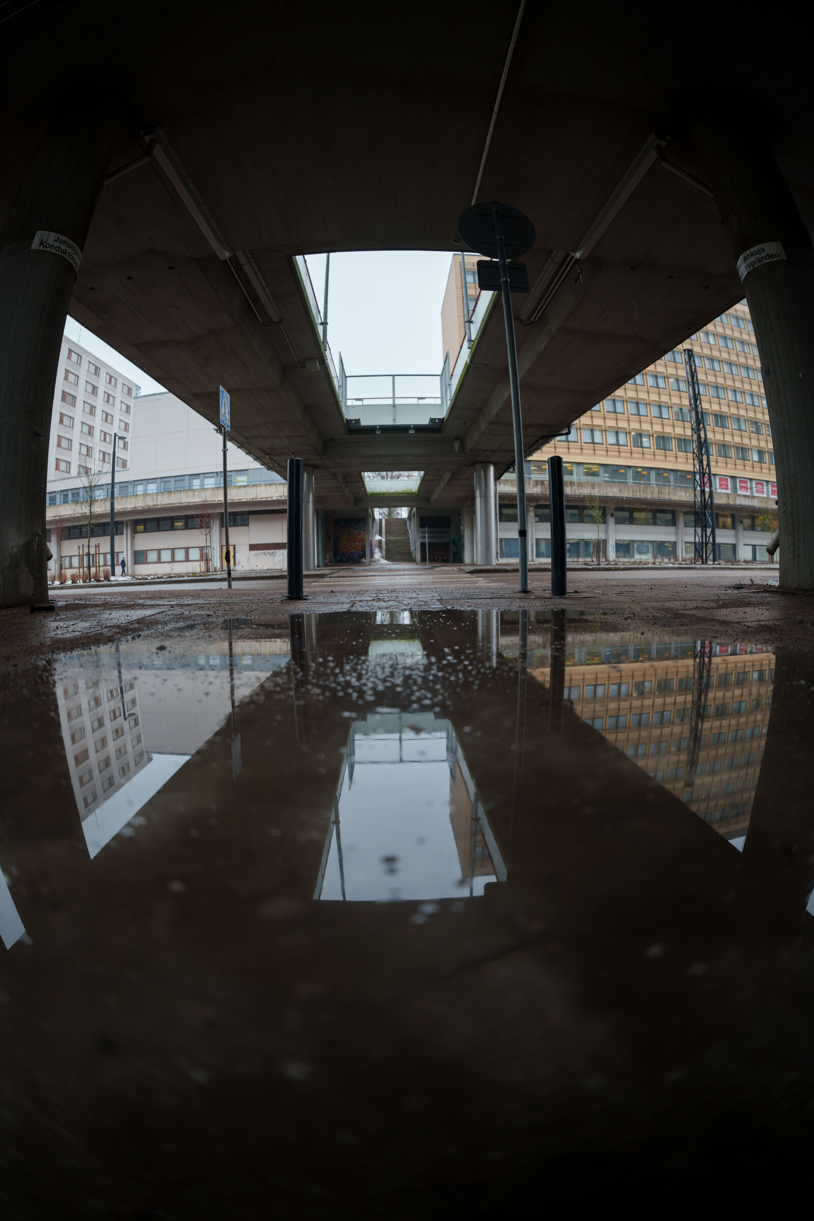 Sigma 15mm F1.4 DG DN Diagonal Fisheye Art sample photo. Bridge over street photography