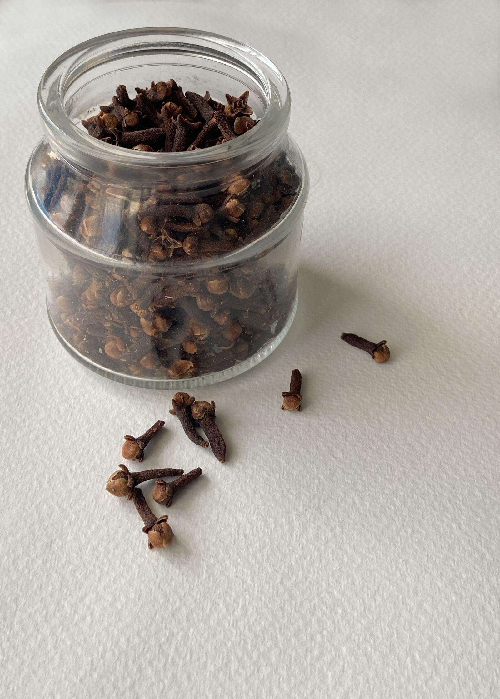 Apple iPhone 11 sample photo. Cloves, spices, jar photography