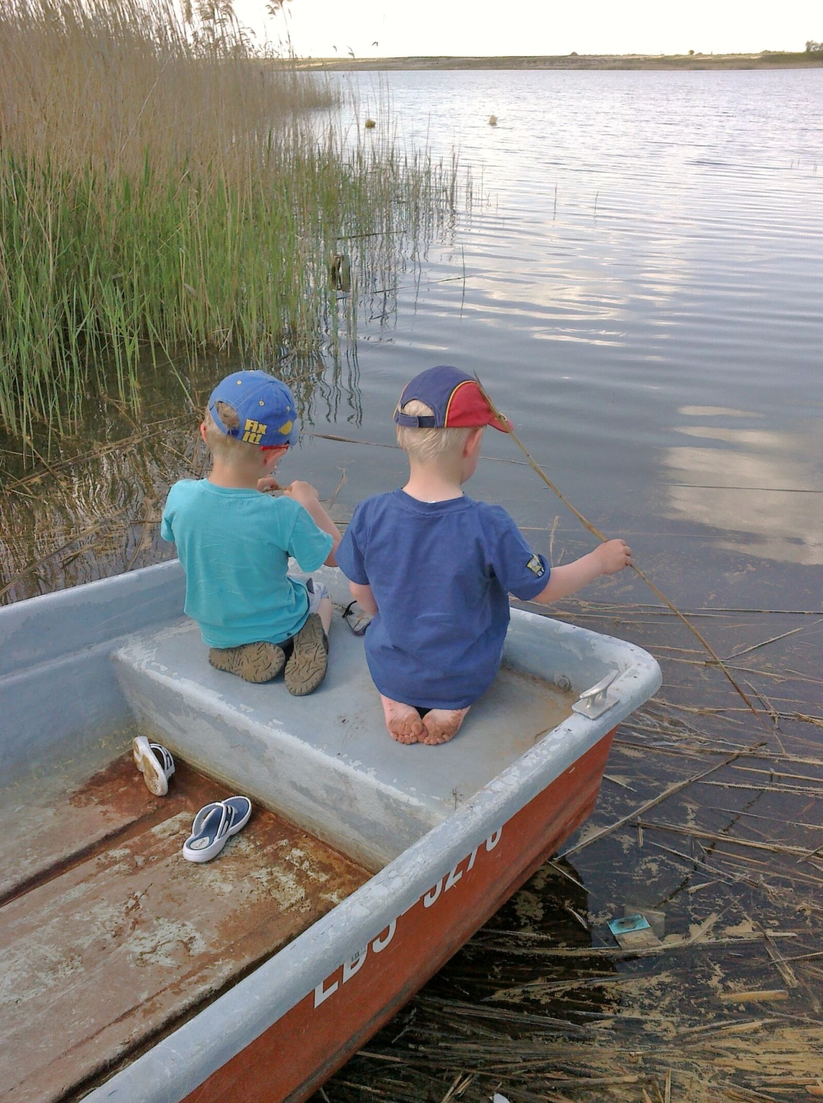 Nokia C5-00.2 sample photo. Children, boat, lake photography