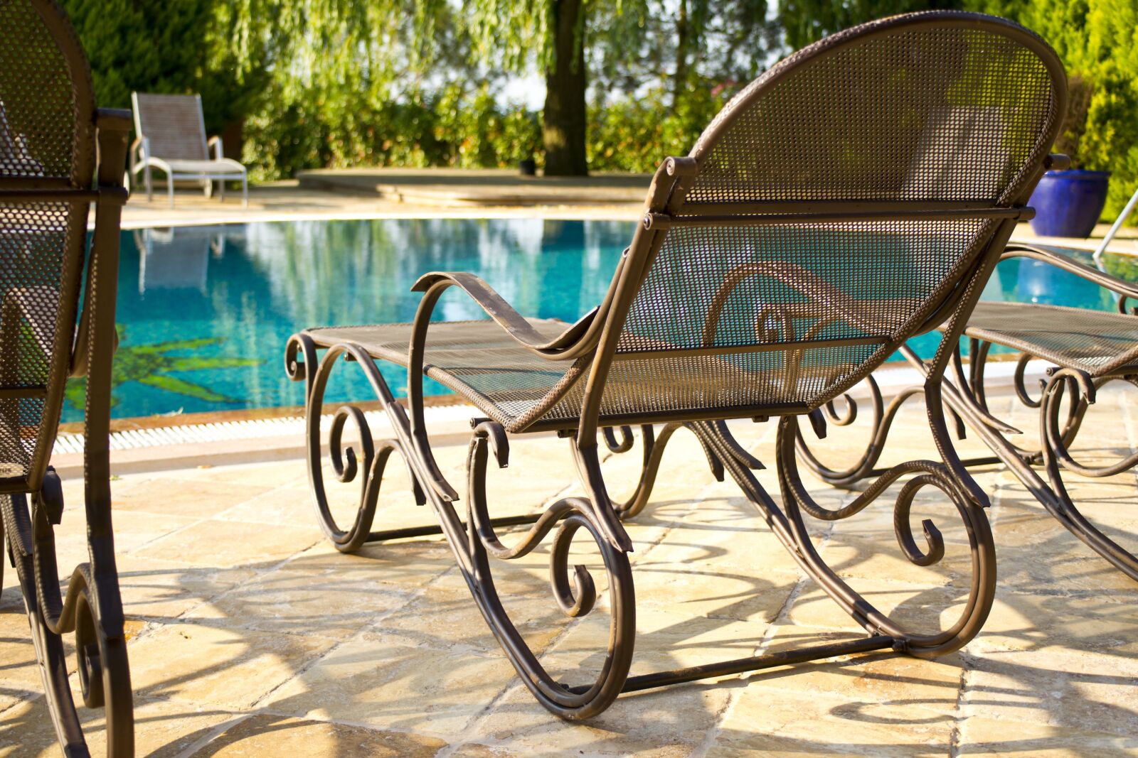 Sony Alpha DSLR-A850 sample photo. Sunbeds, pool, water photography