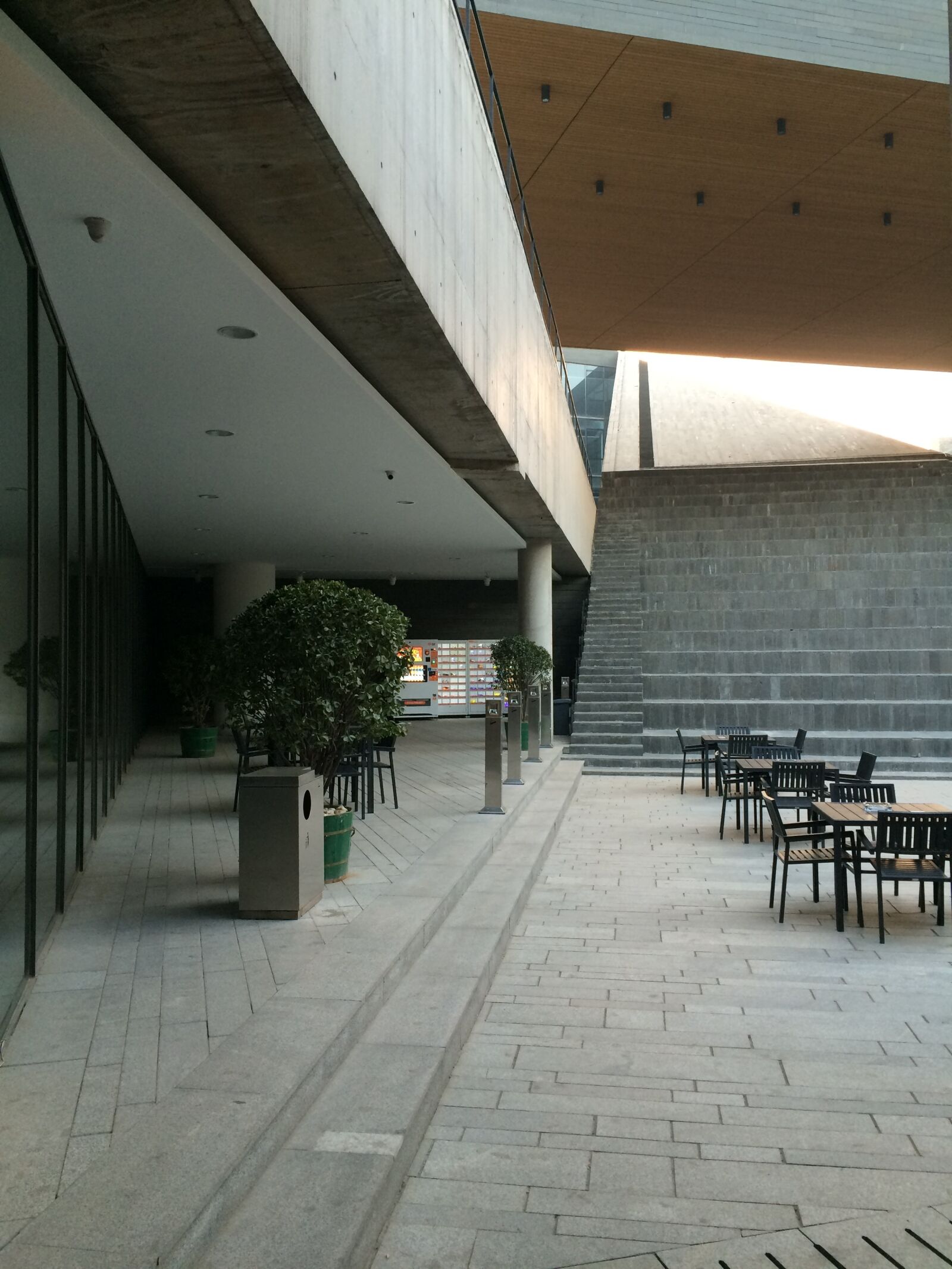 Apple iPhone 5s sample photo. Building, square, smoking area photography