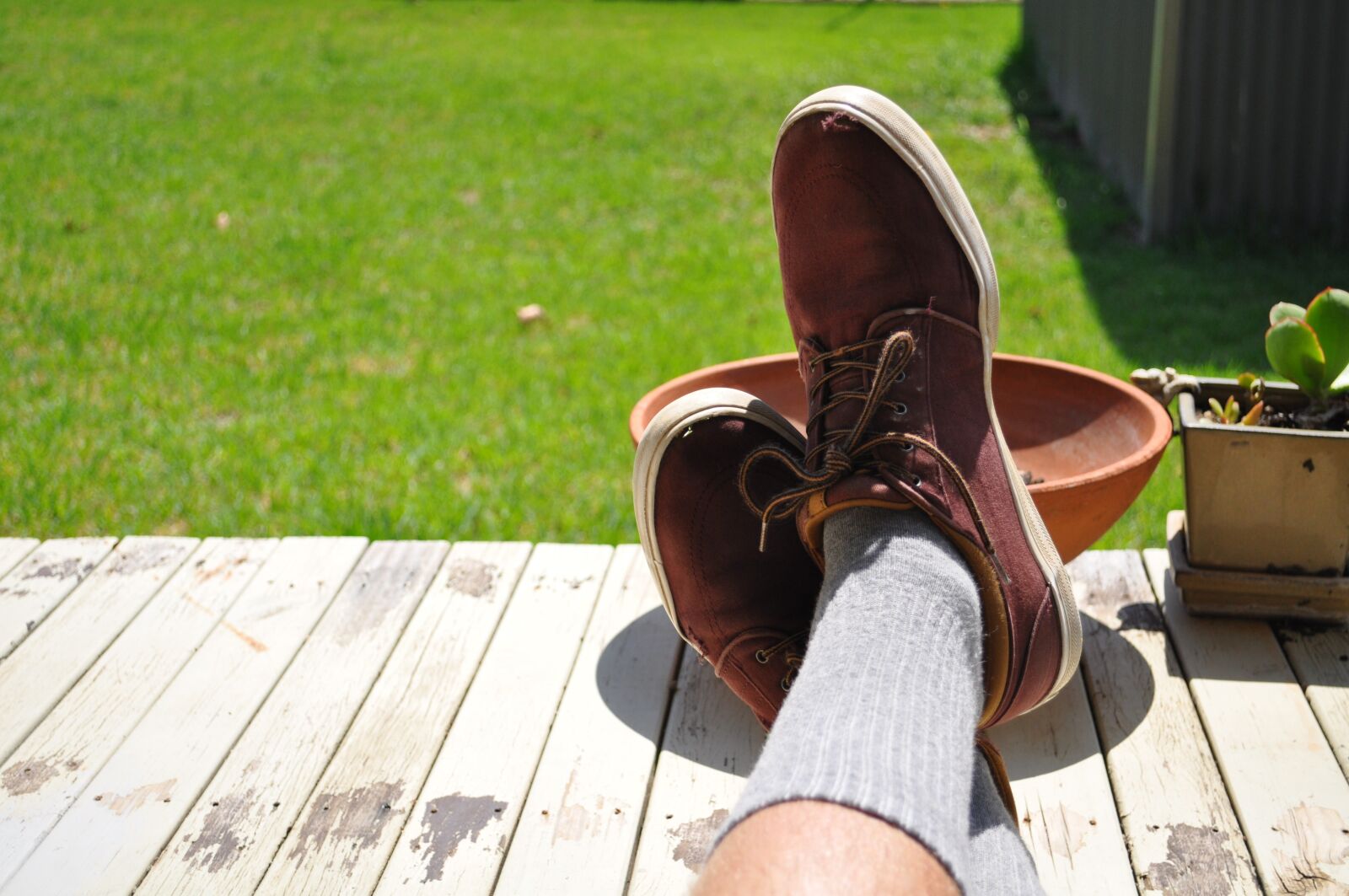 Nikon D5000 sample photo. Grass, shoes, socks photography