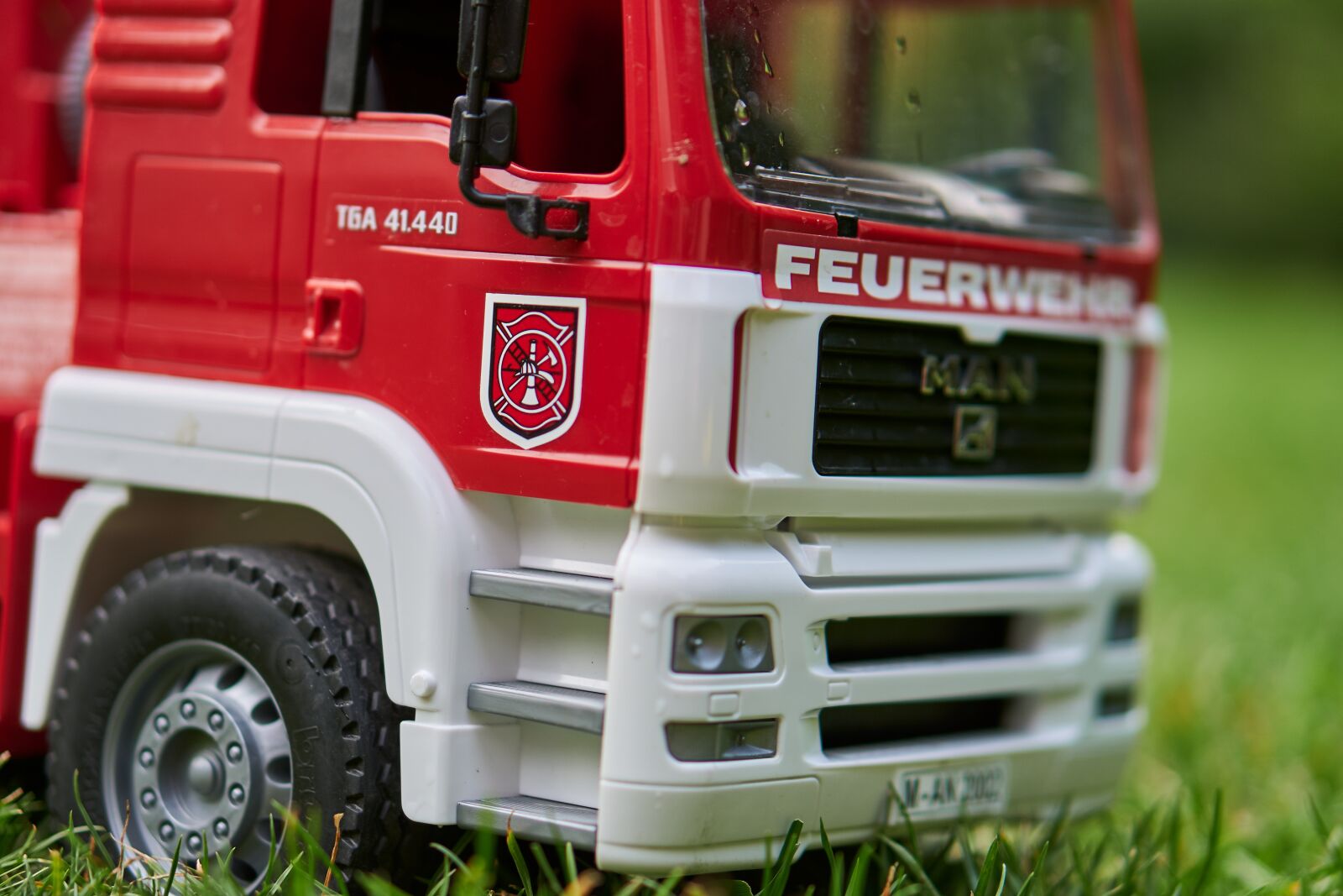 Sony E 50mm F1.8 OSS sample photo. Fire, toys, blue light photography