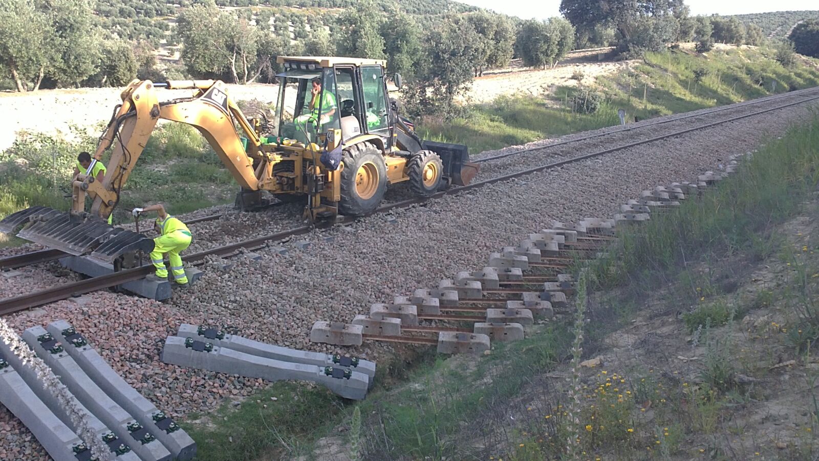 Sony Ericsson U5i sample photo. Train, sleepers, excavator photography