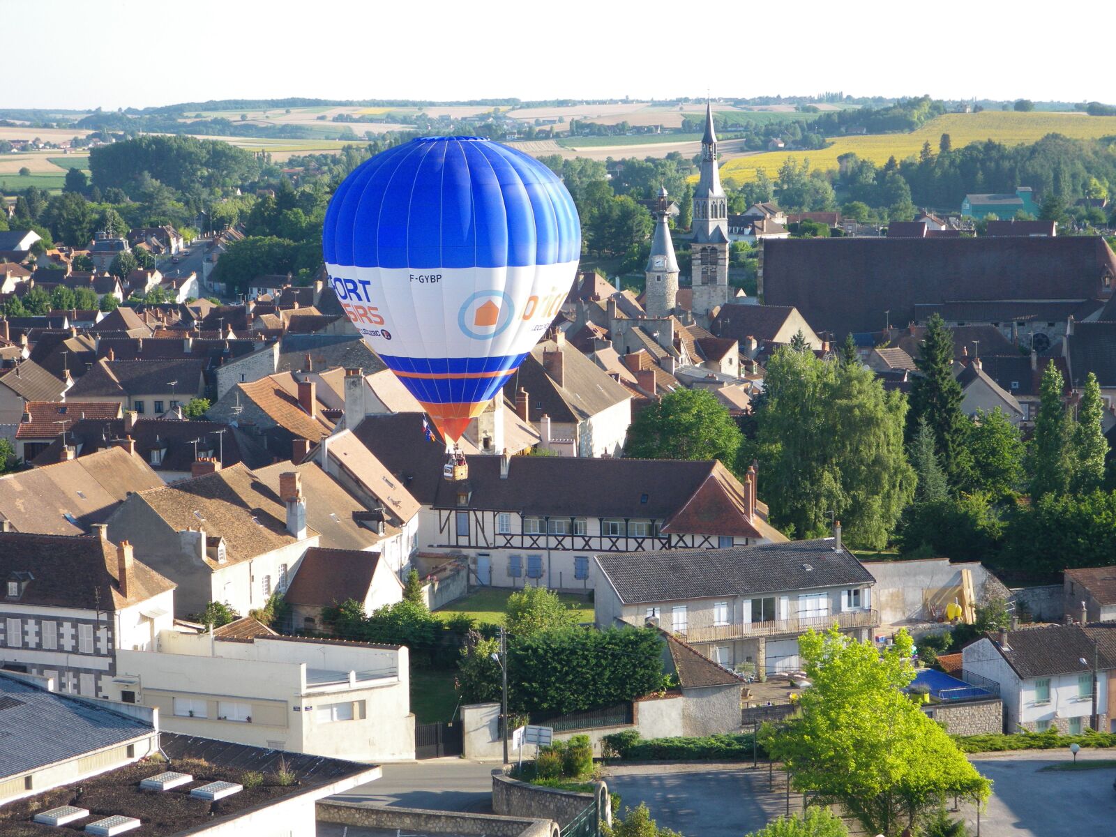Pentax Optio P80 sample photo. Hot-air ballooning, city, st photography