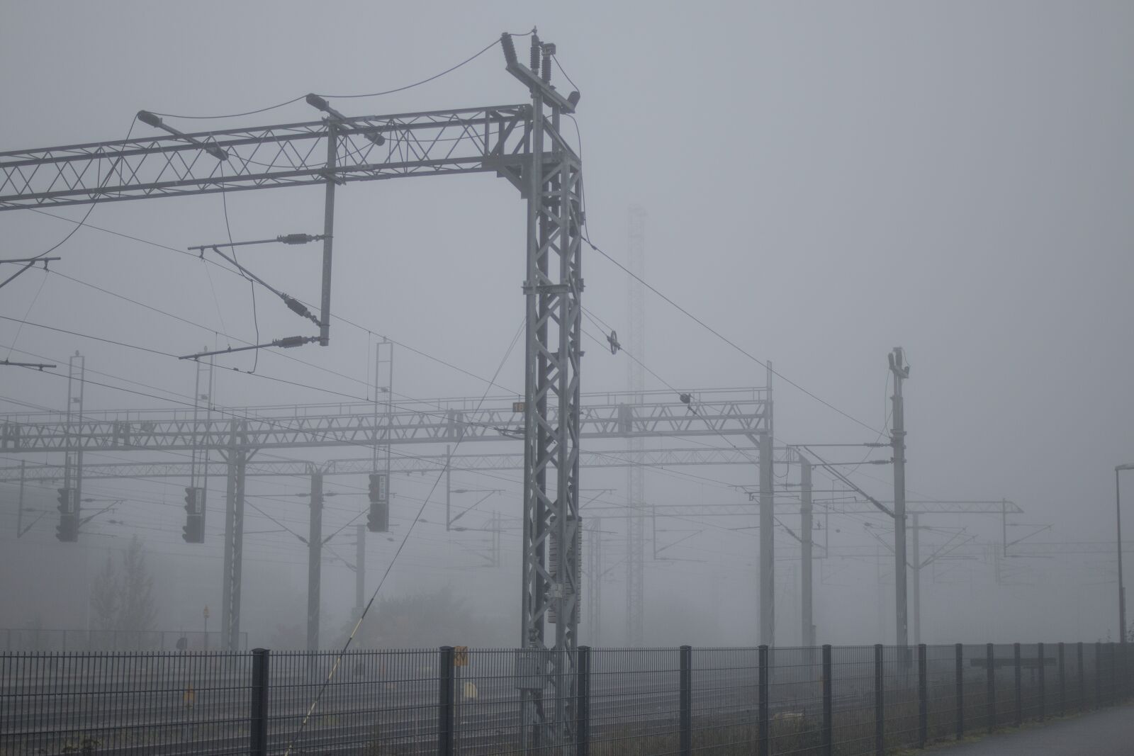 Canon EF 35mm F2 sample photo. Mist, fog, railway track photography