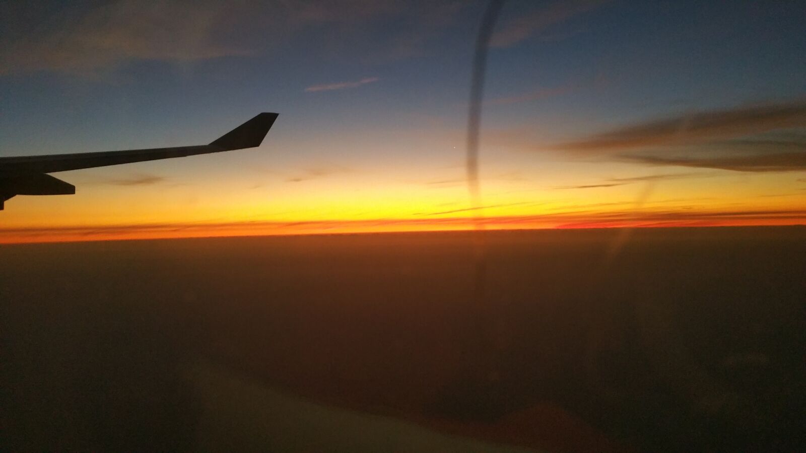 Samsung Galaxy Note4 sample photo. Wing, plane, sunset photography