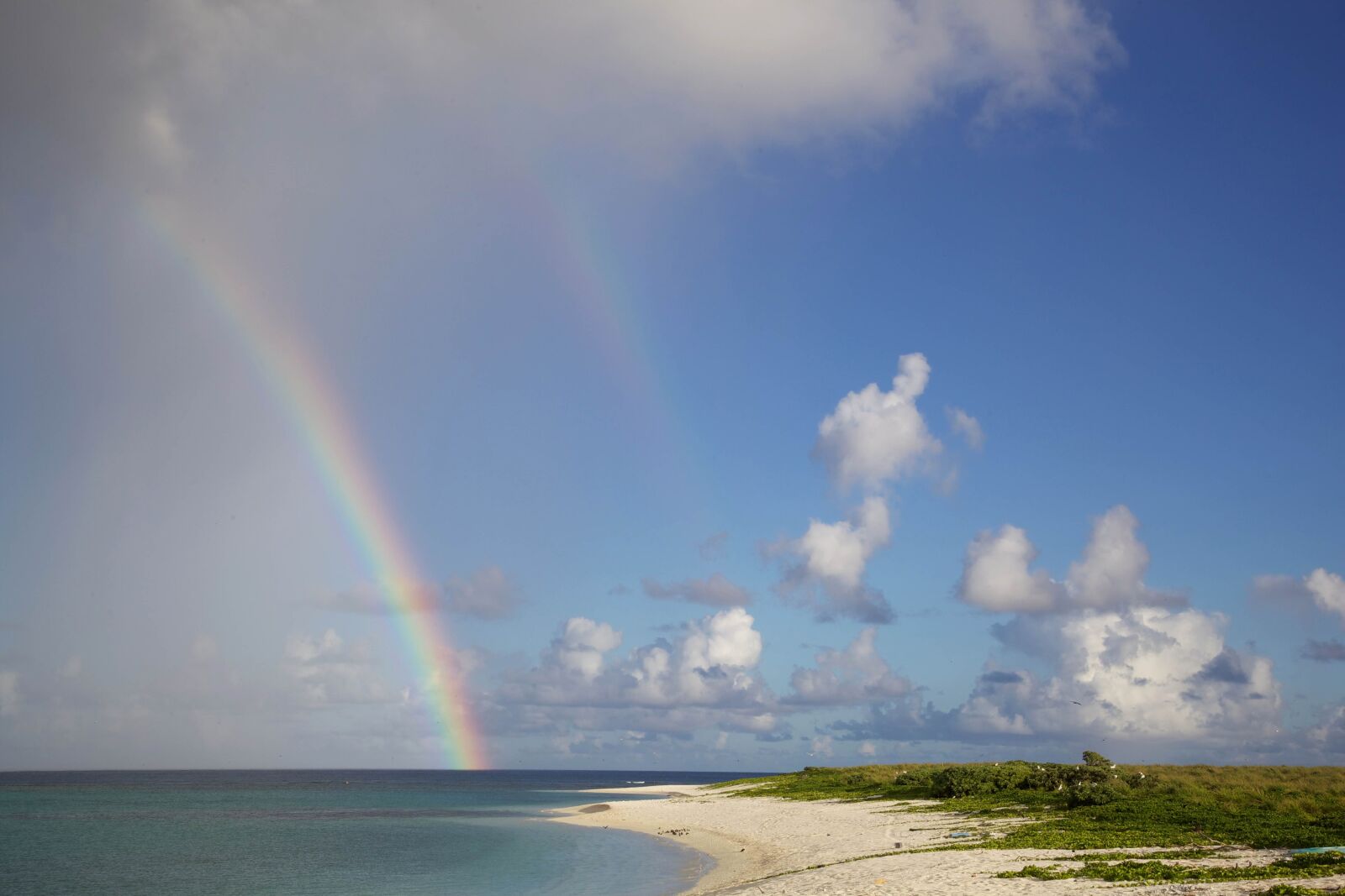 Canon EOS 5D Mark II sample photo. Rainbow, beach, island, sand photography