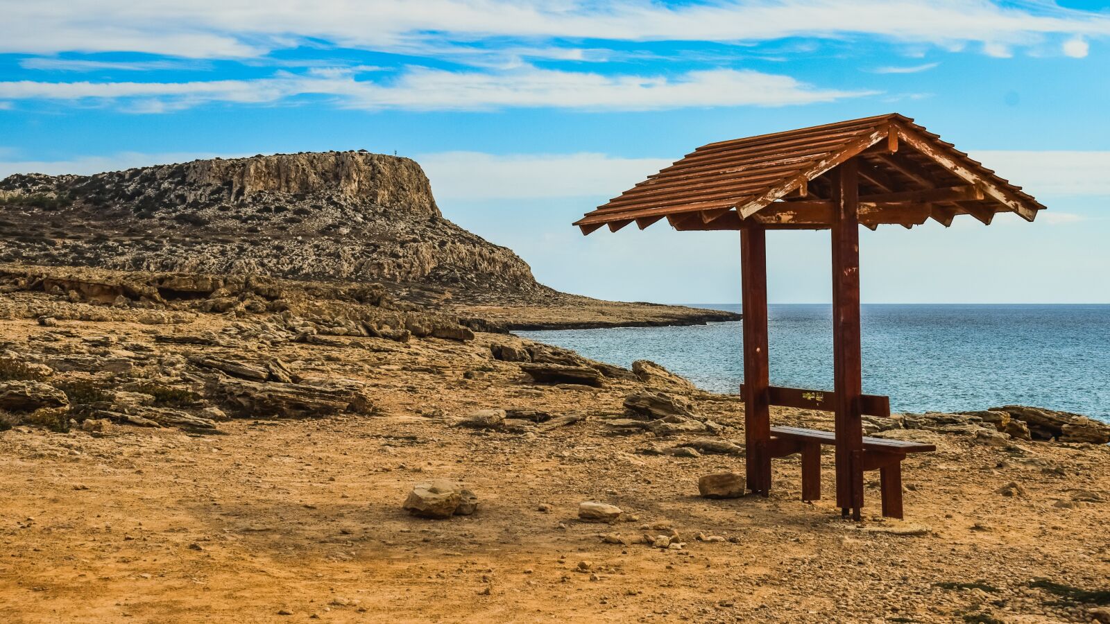 Nikon D3300 sample photo. Kiosk, bench, landscape photography