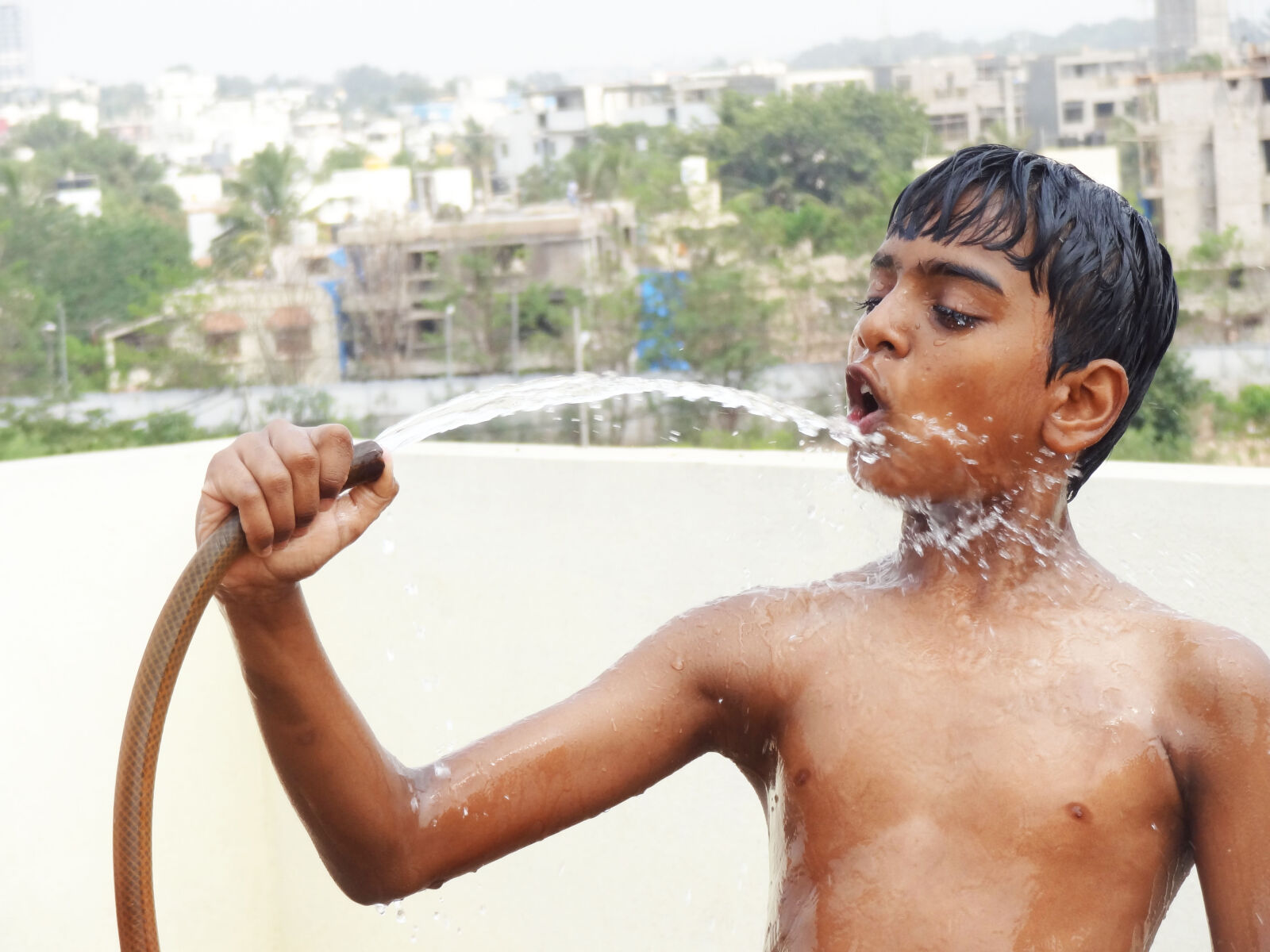 Sony Cyber-shot DSC-HX9V sample photo. Boy, looking, at, water photography