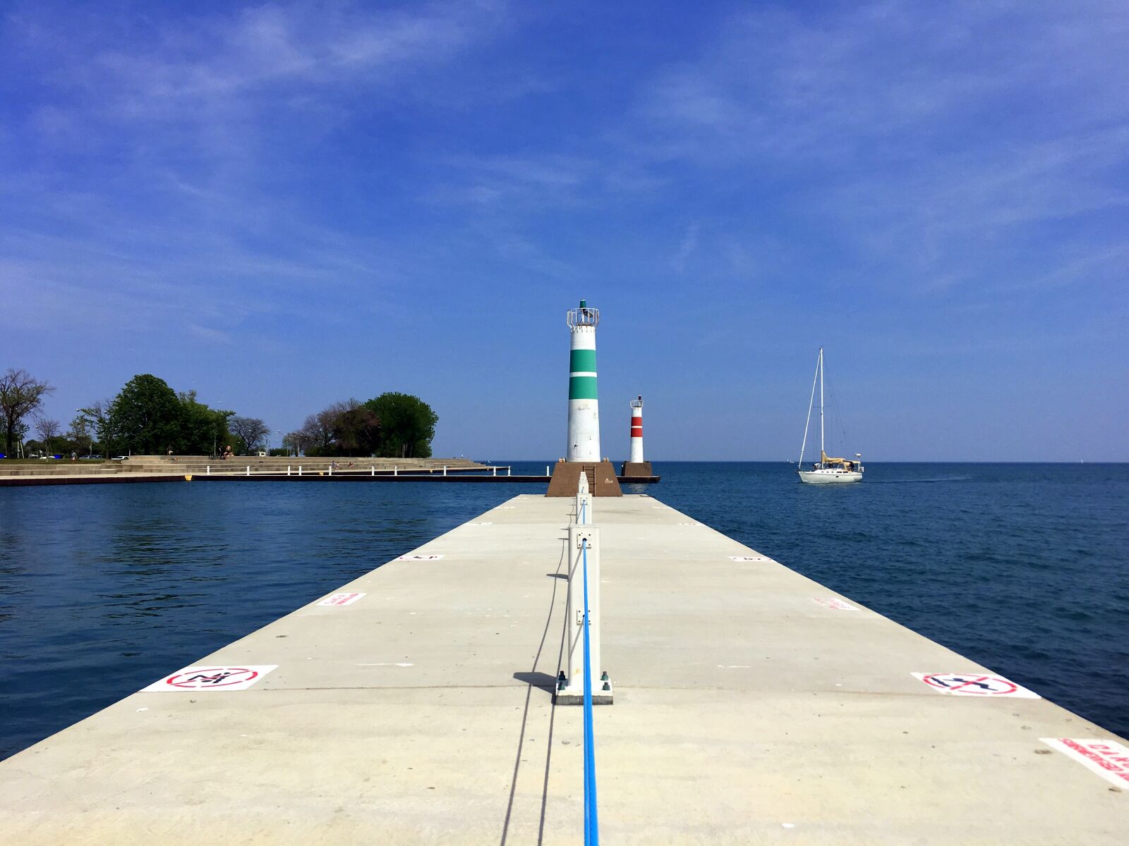 Apple iPhone 6s sample photo. Lake, lighthouse, sailboat photography