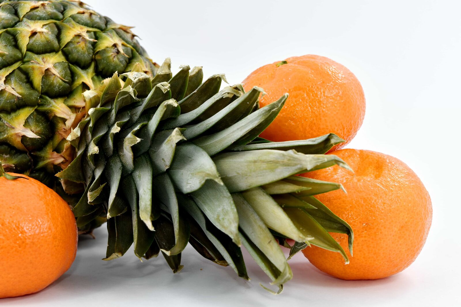 Nikon D5500 sample photo. Green leaves, mandarin, oranges photography