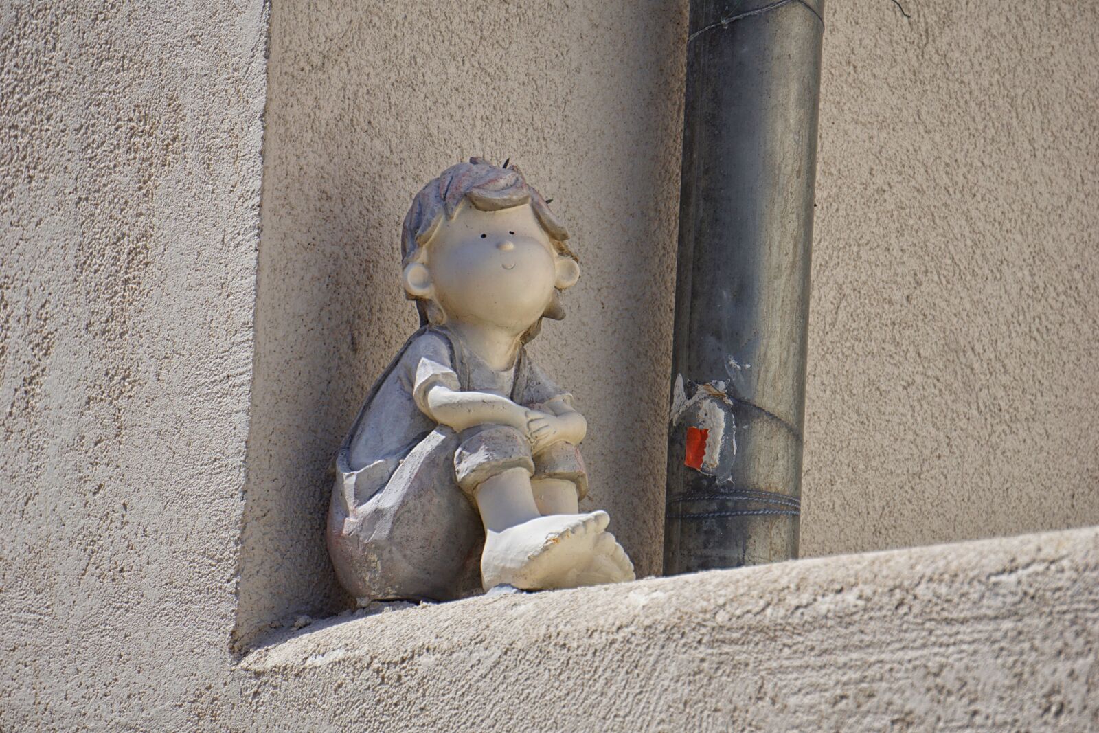Sony E 55-210mm F4.5-6.3 OSS sample photo. Character, statue, earthenware photography