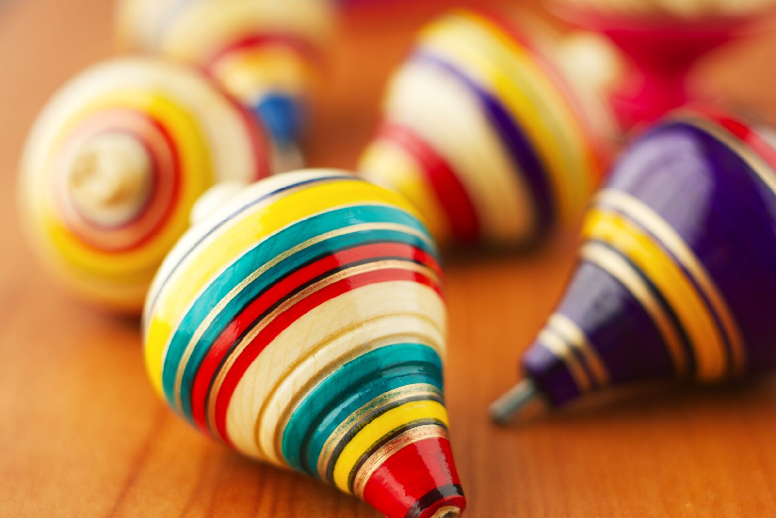Sony FE 50mm F1.8 sample photo. Toys, wood, spinning tops photography