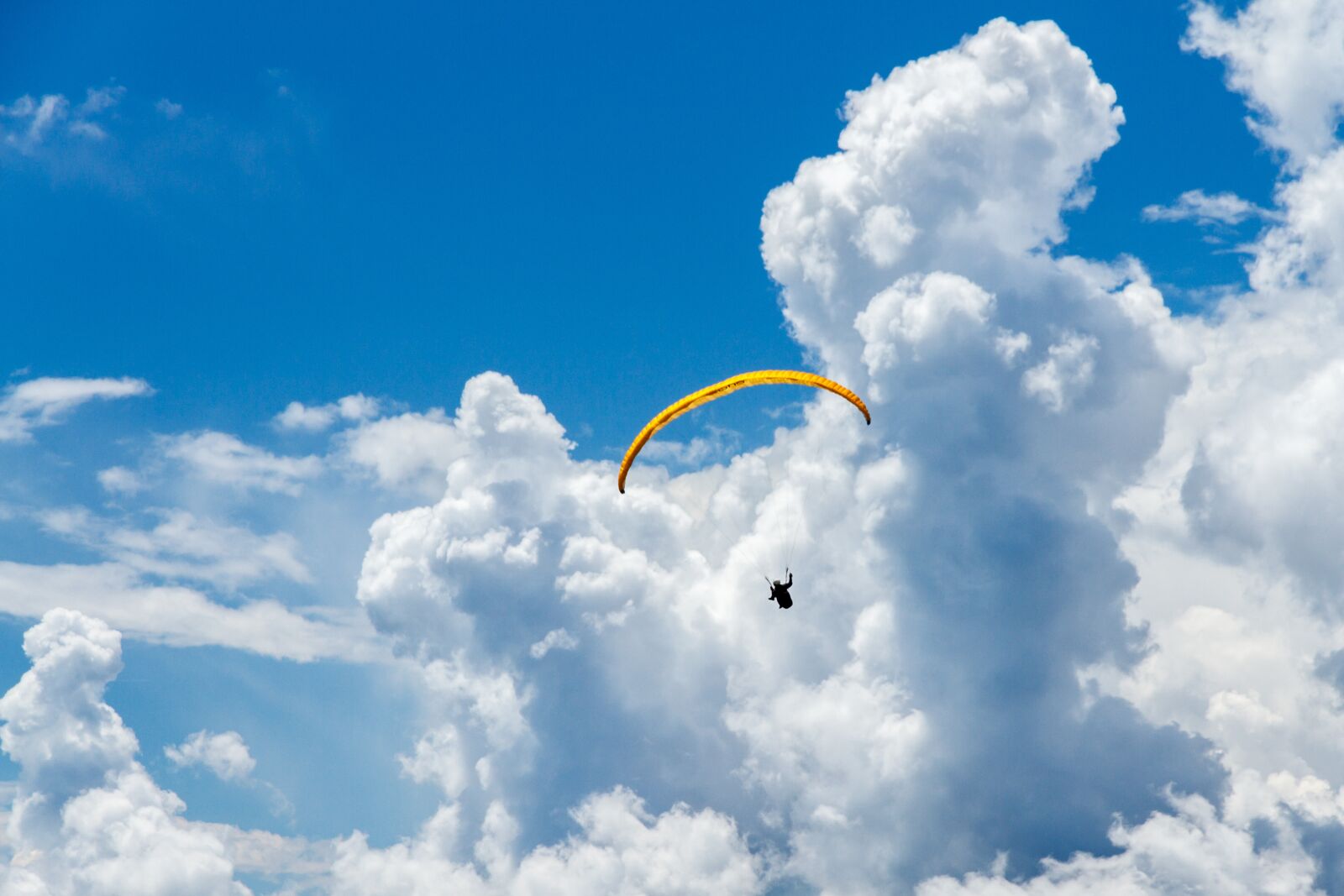 Canon EOS 7D sample photo. Clouds, parachute, paragliding photography