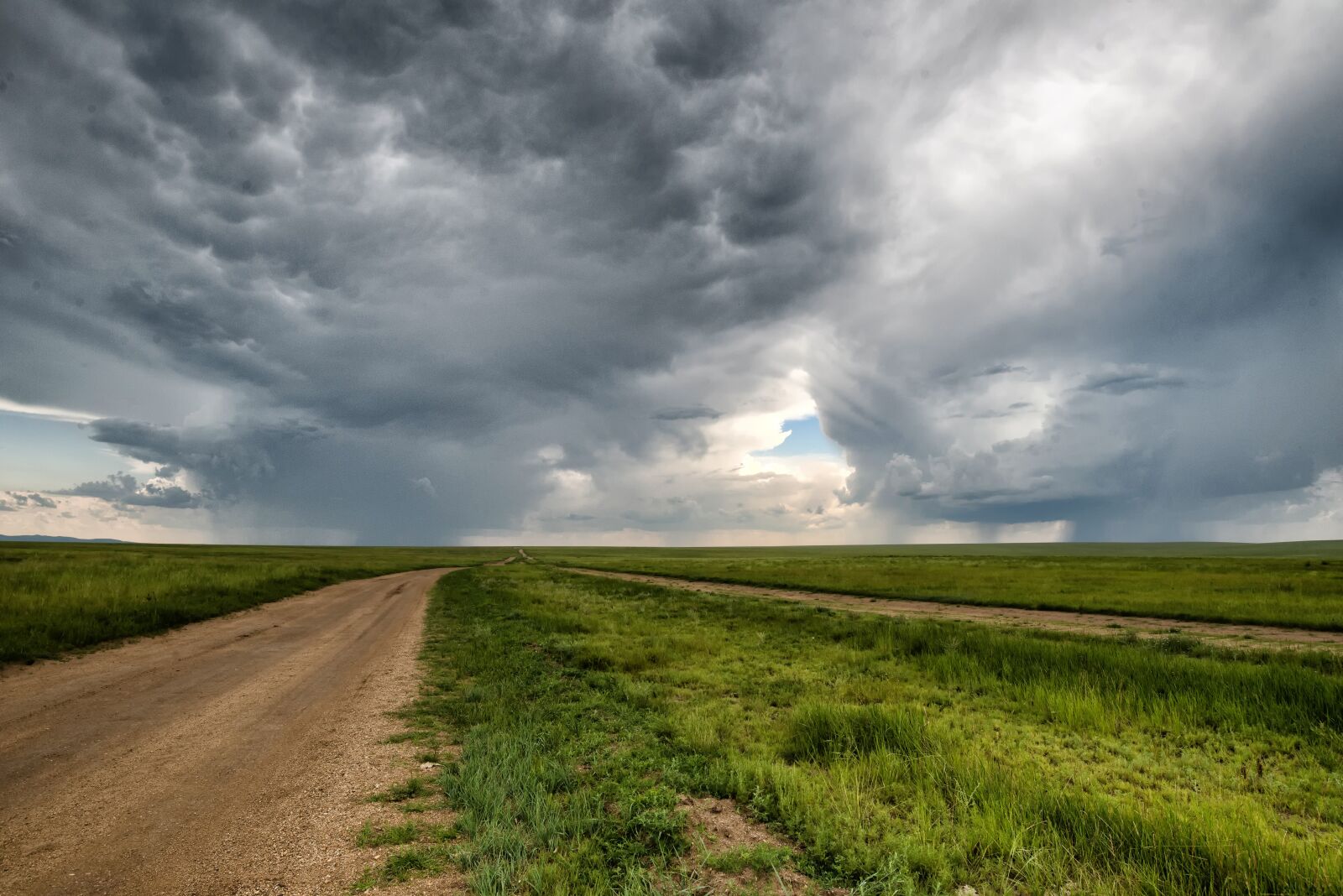 Nikon D800E sample photo. Road, earth, storm photography