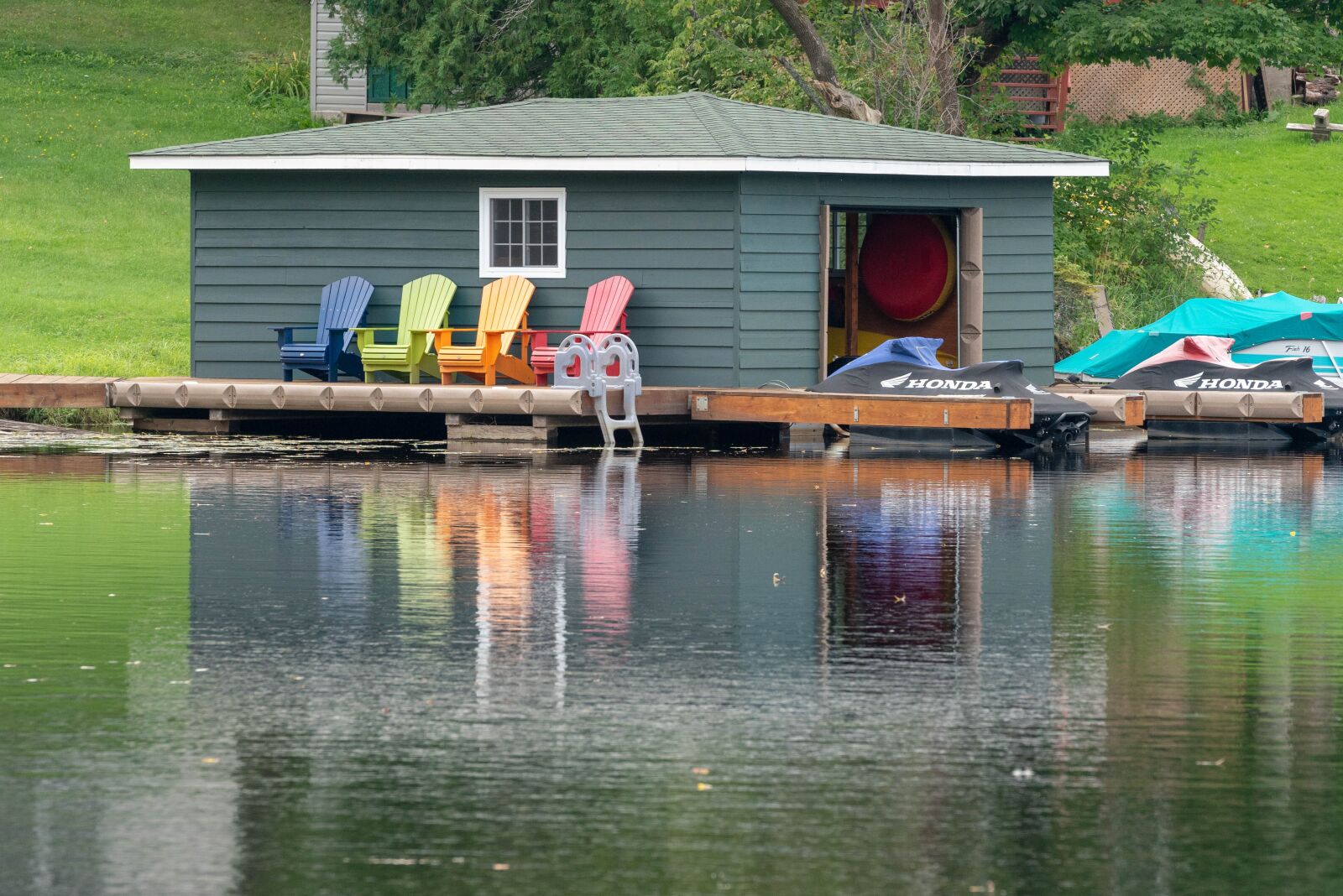 Sony a7R III sample photo. Boat house, dock, water photography