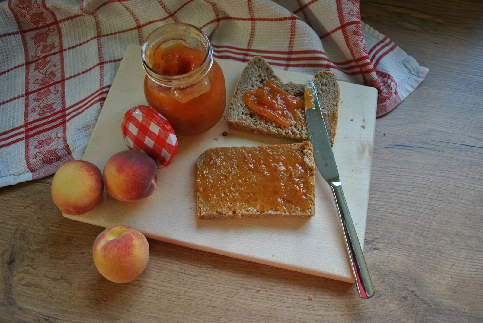Nikon D3000 sample photo. Peach, jam, food photography